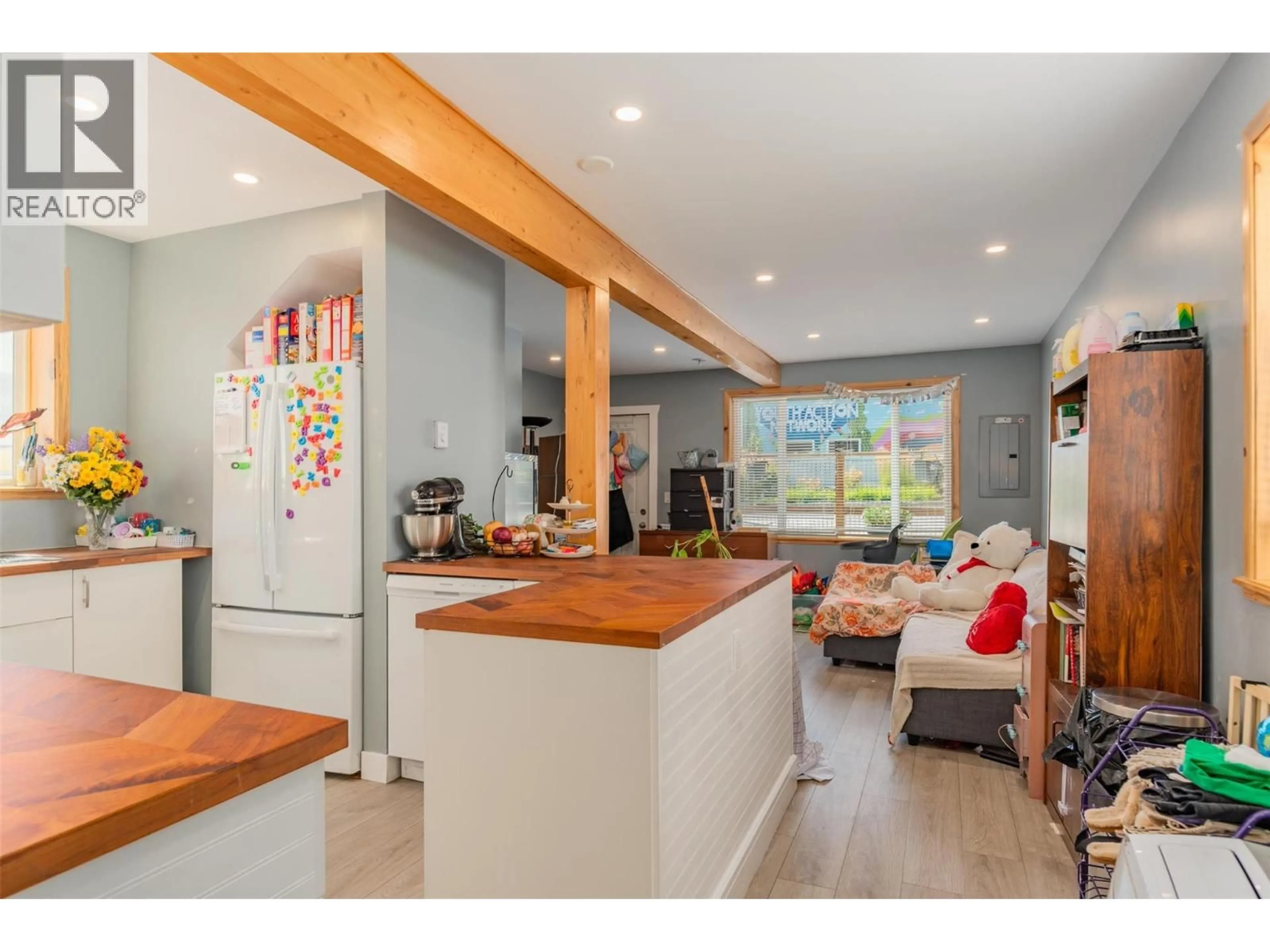 Open concept kitchen, wood/laminate floor for 2342 WASHINGTON STREET, Rossland British Columbia V0G1Y0