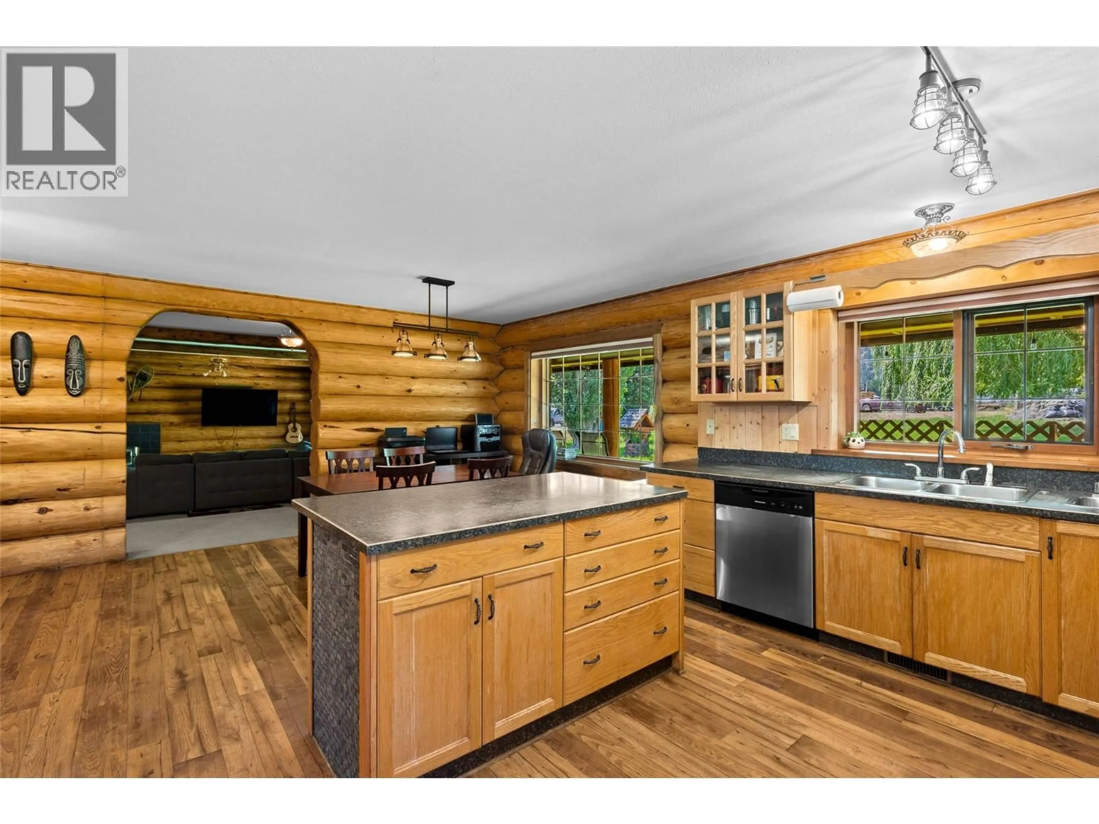 Open concept kitchen, wood/laminate floor for 311 HOLLYWOOD CRESCENT, Lillooet British Columbia V0K1V0