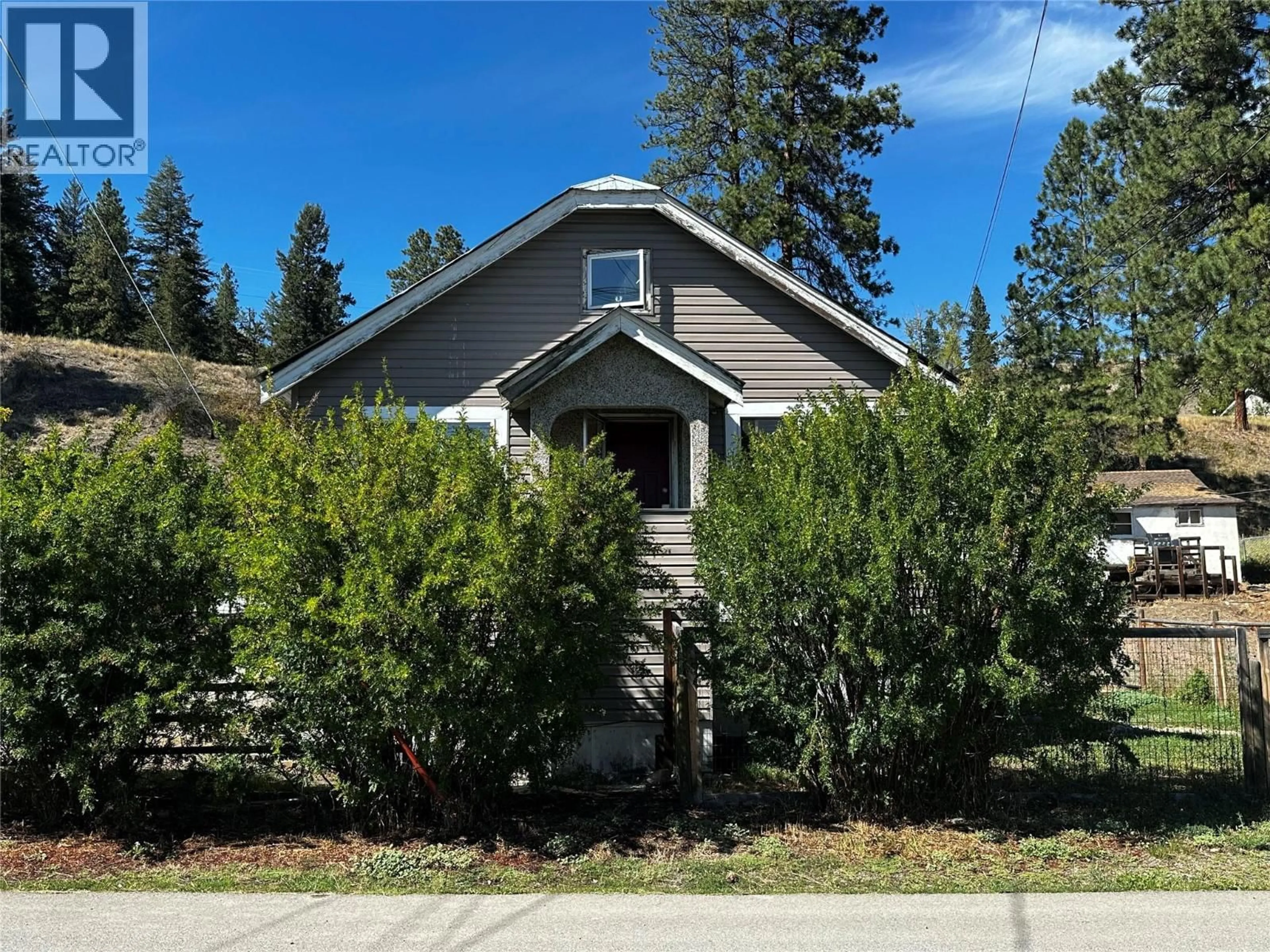 Home with vinyl exterior material, street for 569 AUBURN CRESCENT, Princeton British Columbia V0X1W0