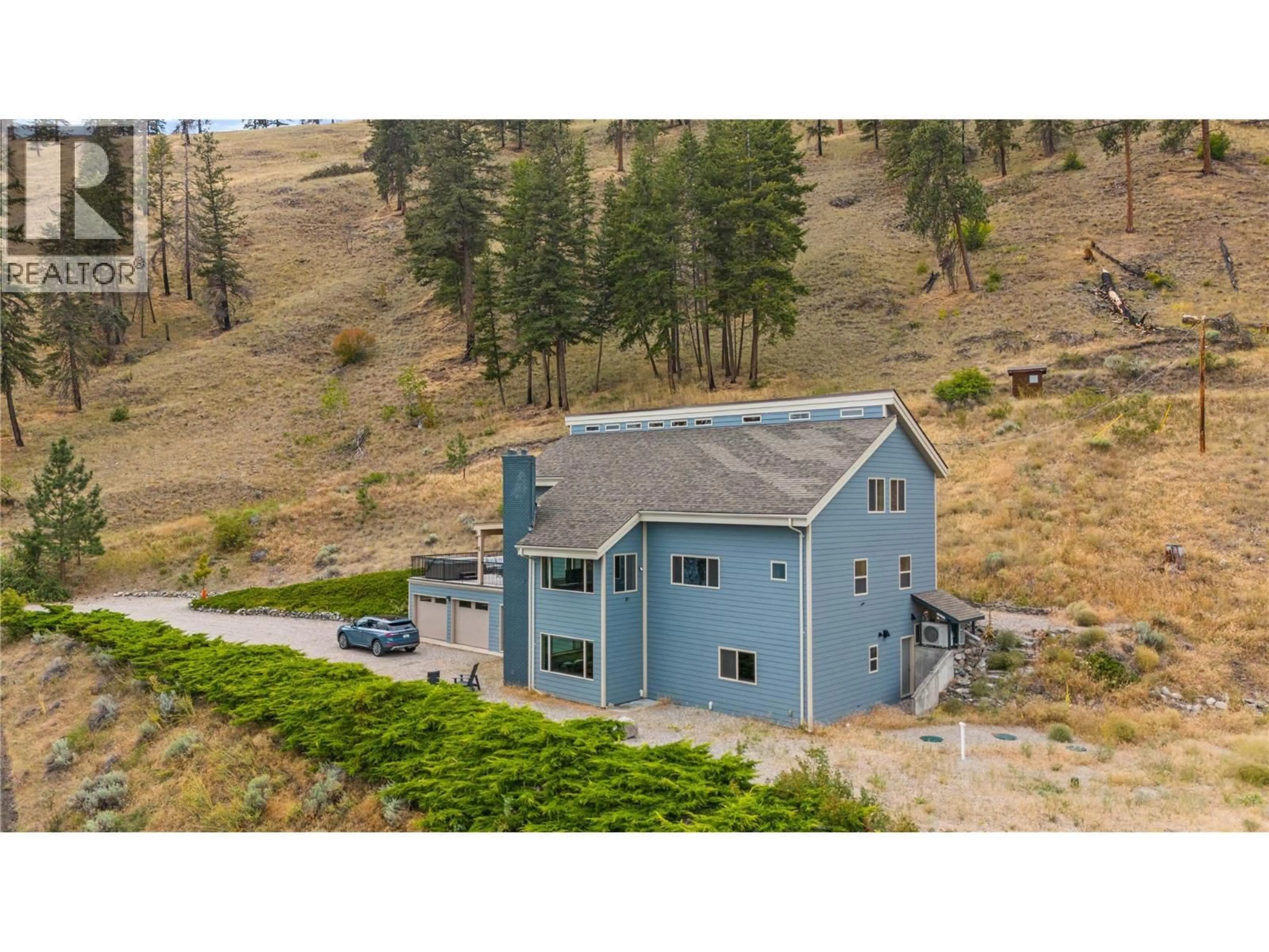 A pic from outside/outdoor area/front of a property/back of a property/a pic from drone, mountain view for 432 HWY 97 HIGHWAY, Summerland British Columbia V0H1Z6
