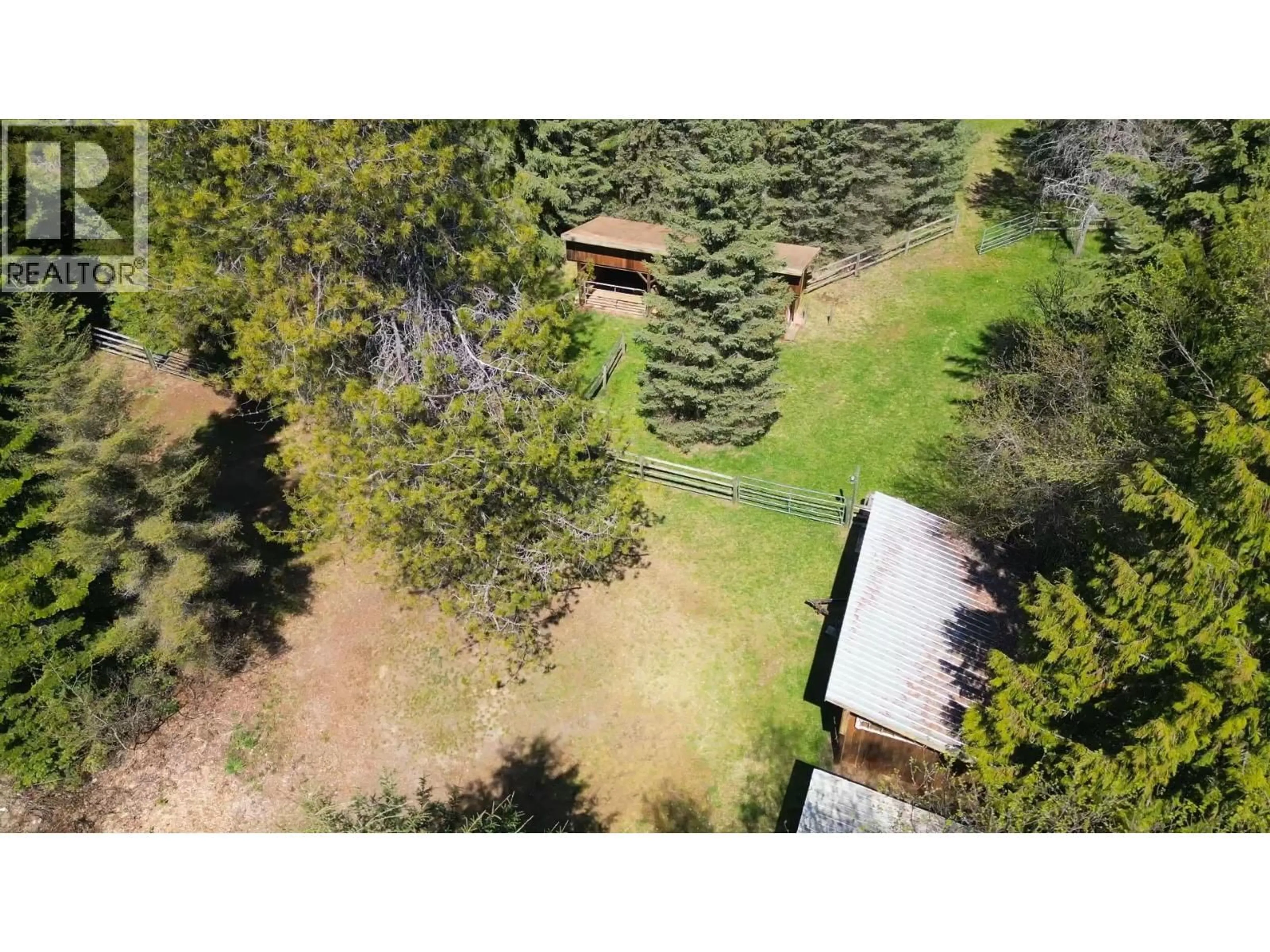 A pic from outside/outdoor area/front of a property/back of a property/a pic from drone, forest/trees view for 6158 REDFISH ROAD, Nelson British Columbia V1L6M9