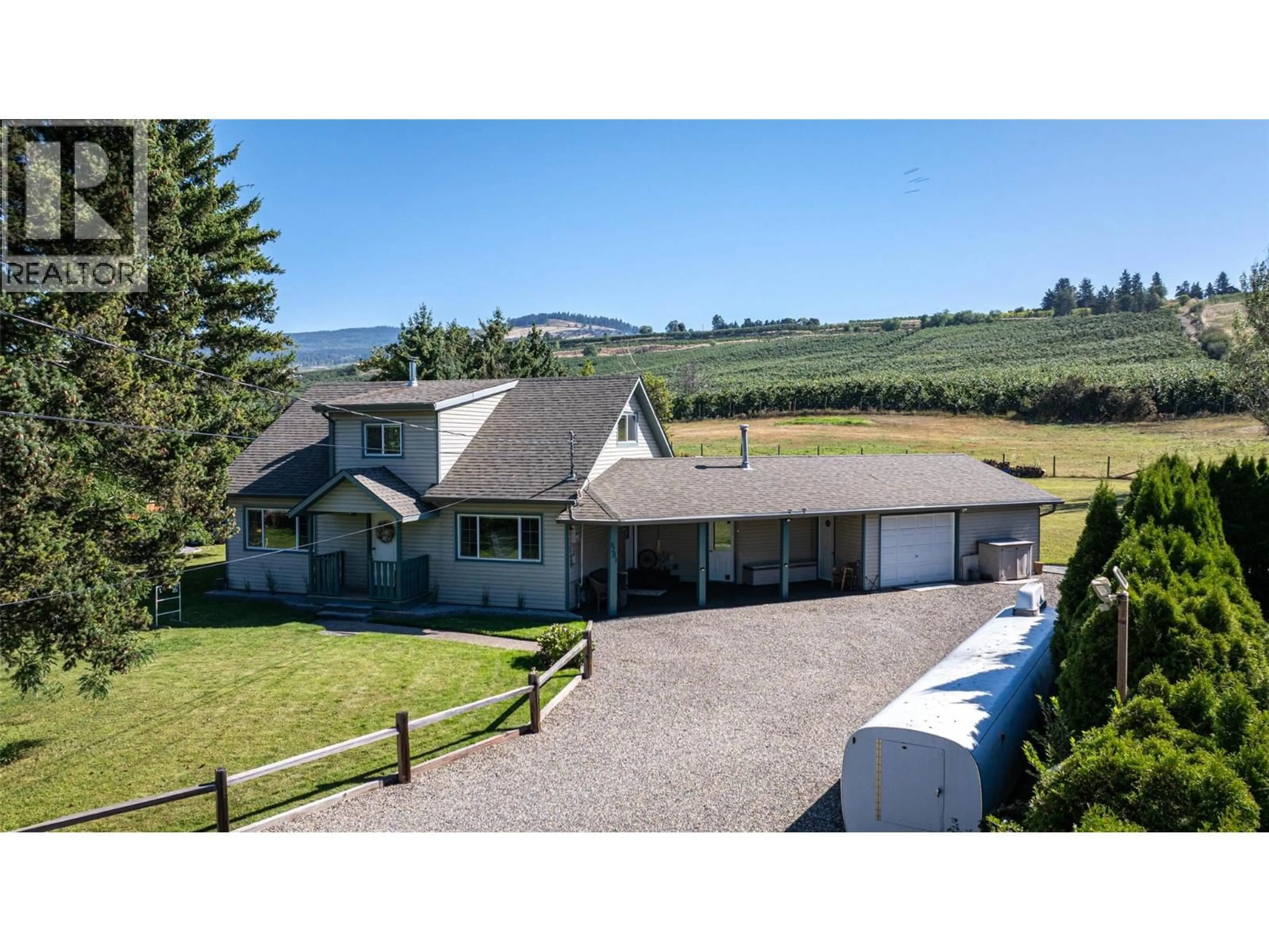 A pic from outside/outdoor area/front of a property/back of a property/a pic from drone, mountain view for 6281 PLEASANT VALLEY ROAD, Vernon British Columbia V1B3R3