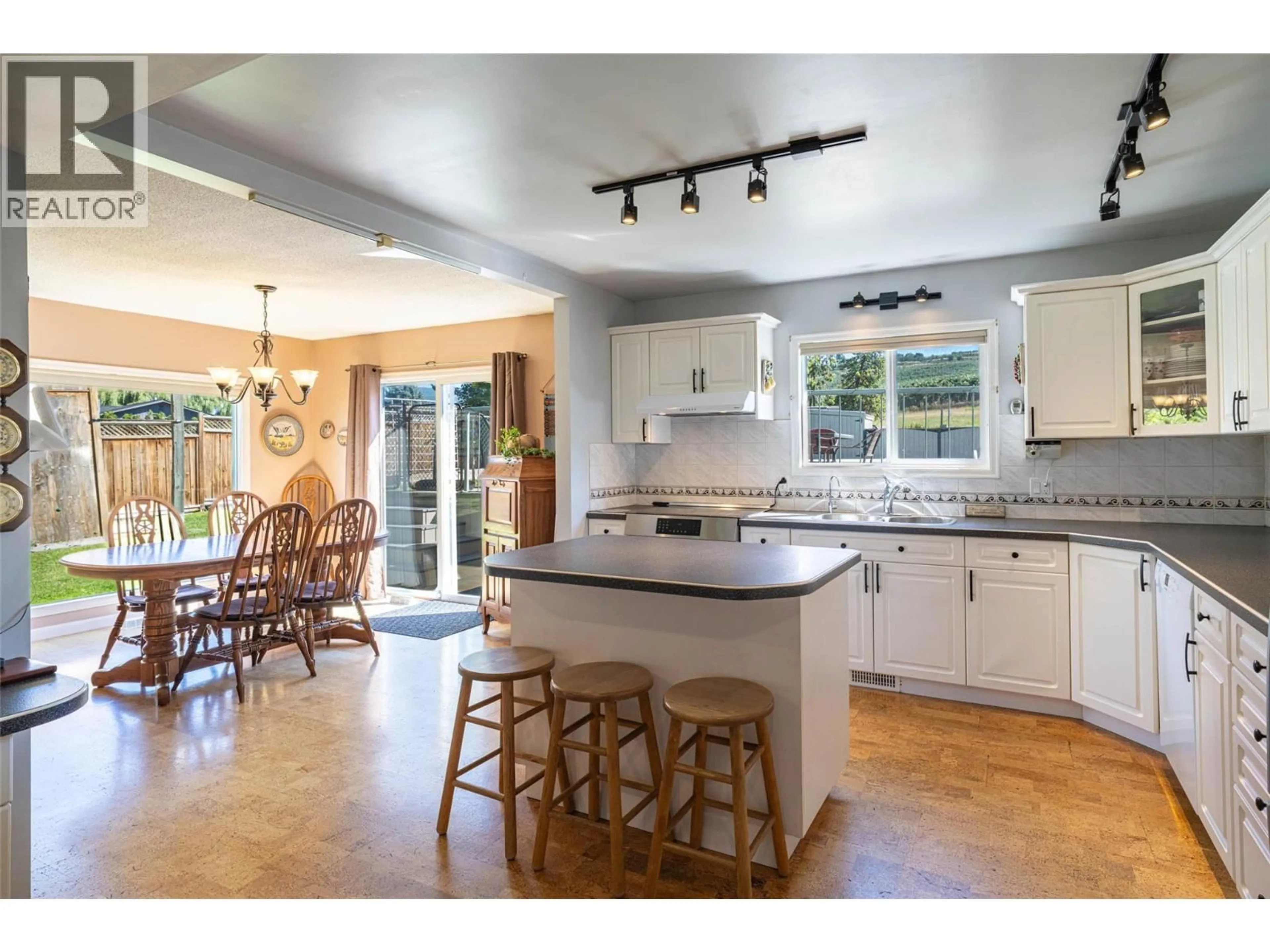 Open concept kitchen, ceramic/tile floor for 6281 PLEASANT VALLEY ROAD, Vernon British Columbia V1B3R3