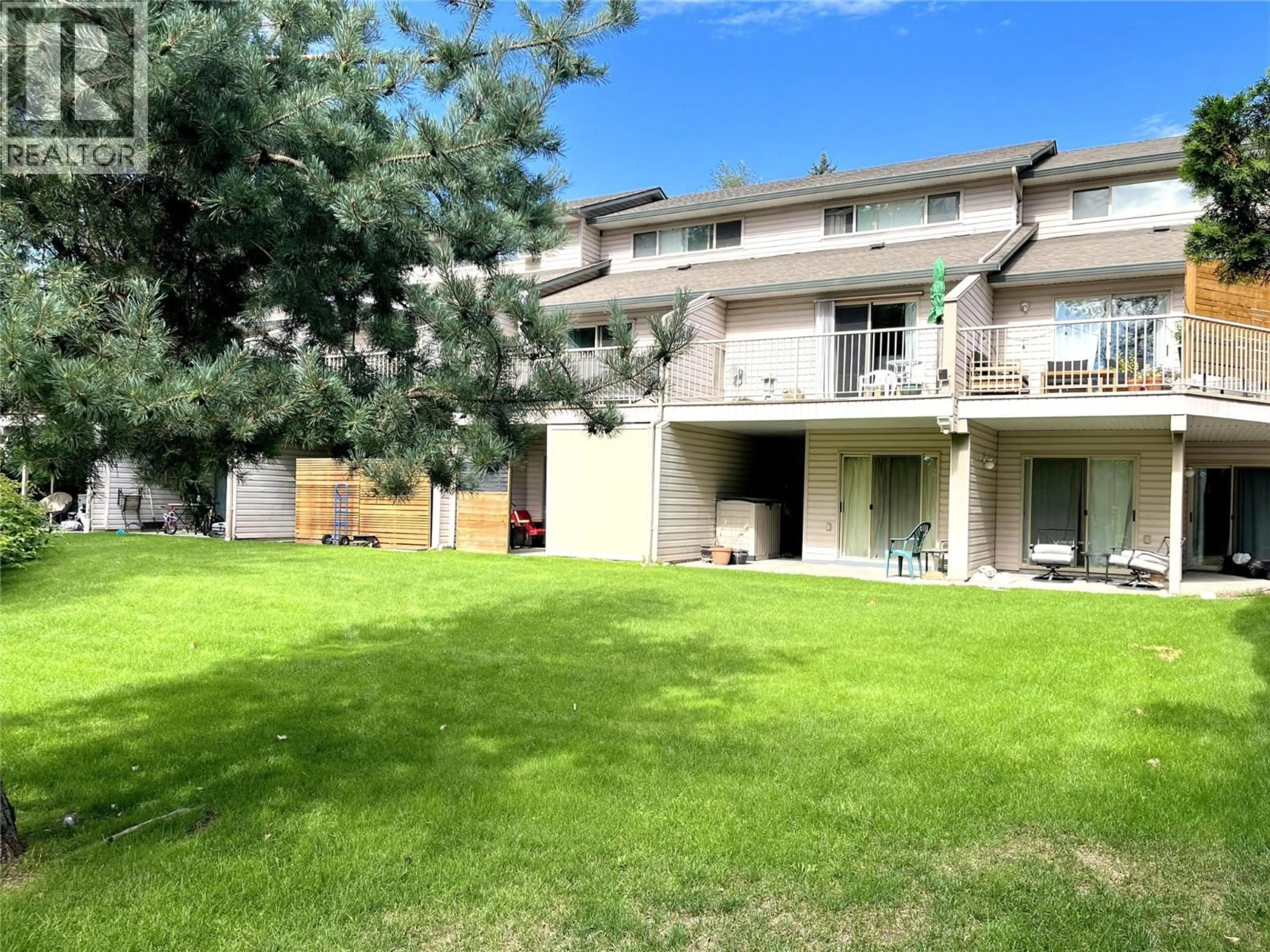 A pic from outside/outdoor area/front of a property/back of a property/a pic from drone, unknown for 304 - 1607 43 AVENUE, Vernon British Columbia V1T9R9