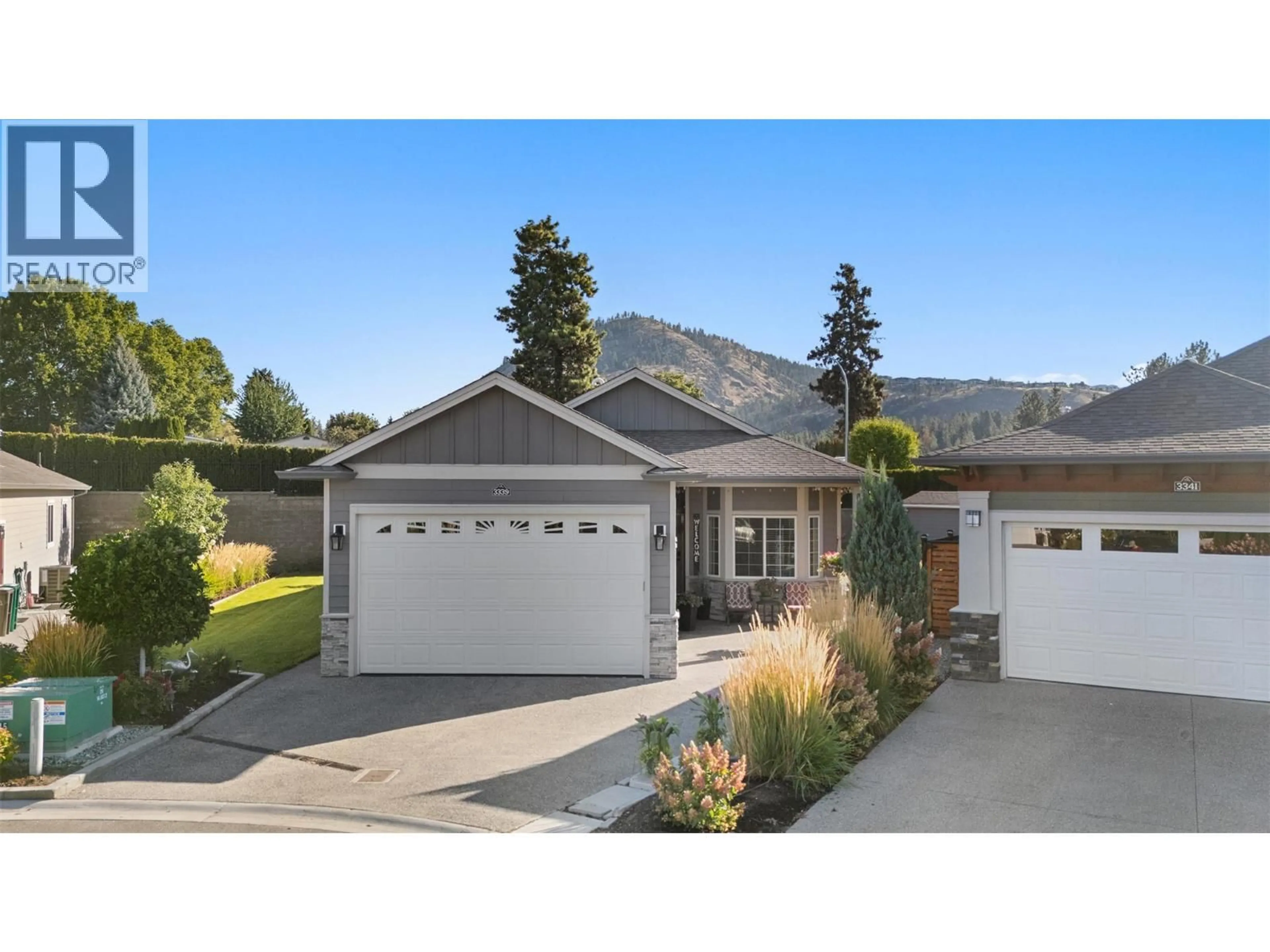 Home with vinyl exterior material, street for 3339 KINGFISHER ROAD, West Kelowna British Columbia V4T3A5