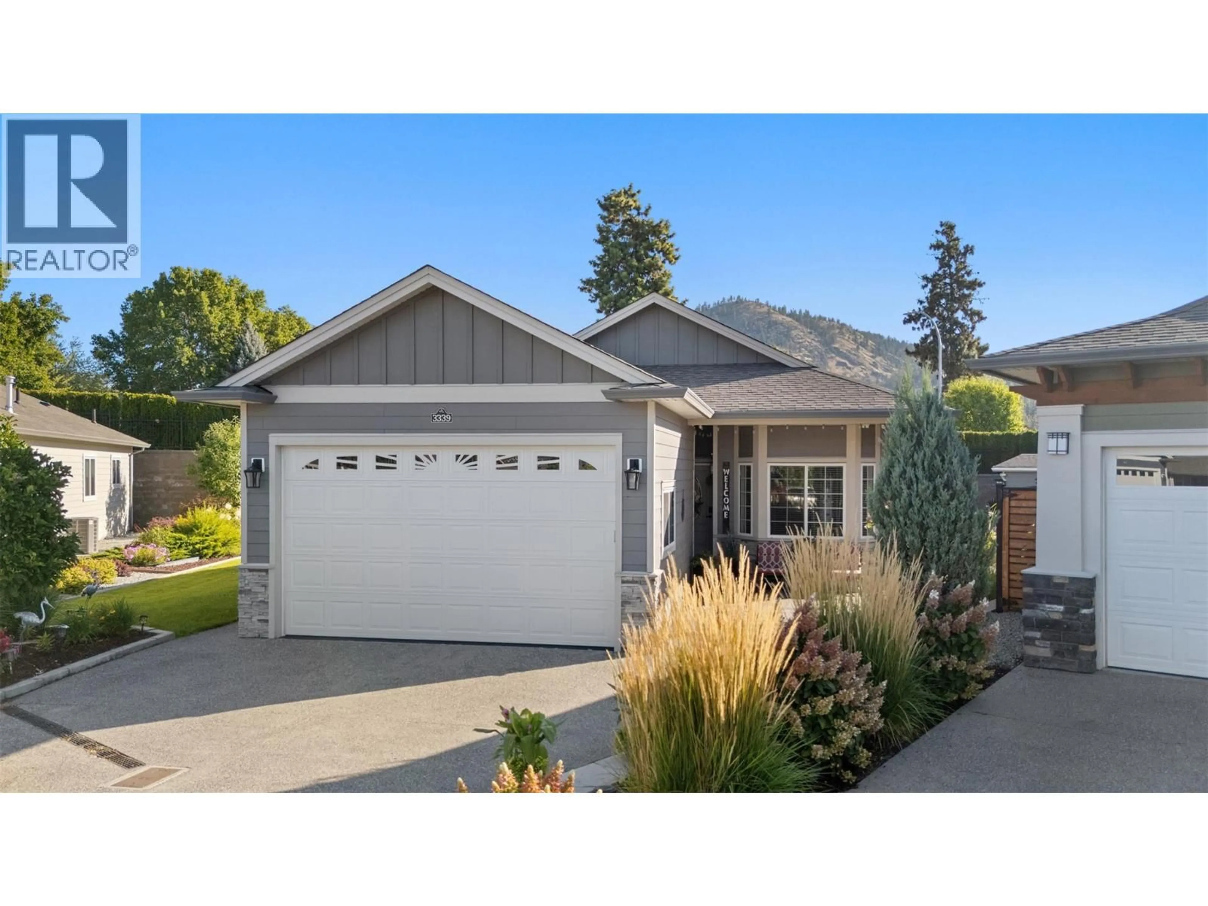Home with vinyl exterior material, street for 3339 KINGFISHER ROAD, West Kelowna British Columbia V4T3A5