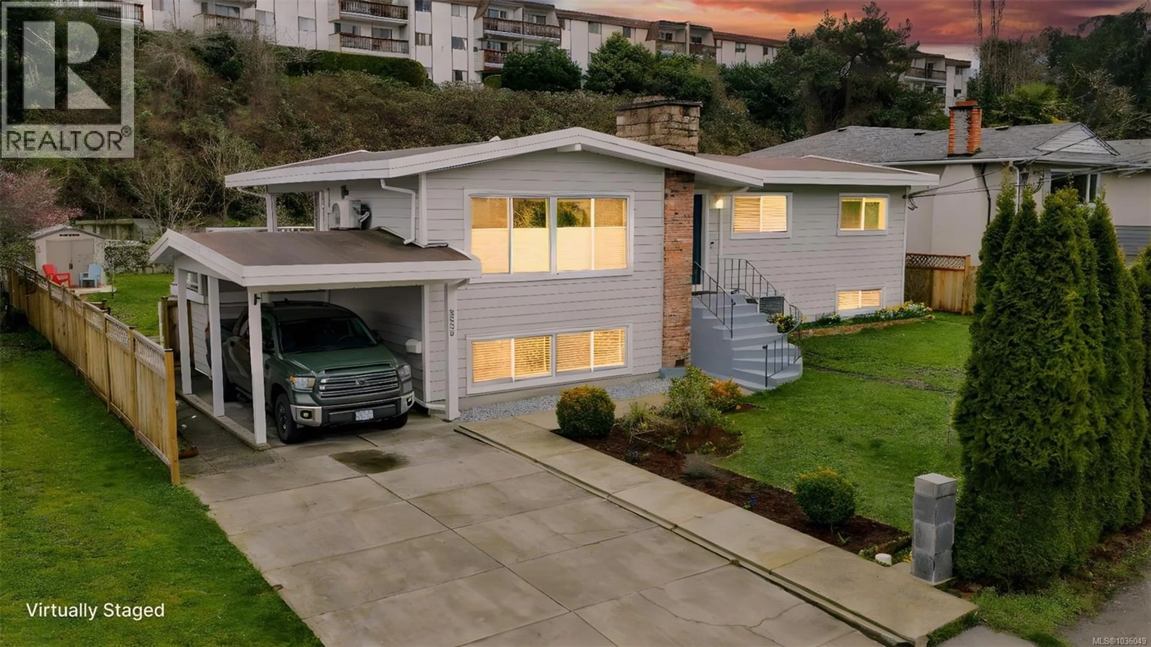 A pic from outside/outdoor area/front of a property/back of a property/a pic from drone, street for 3535 RICHMOND ROAD, Saanich British Columbia V8P4P9