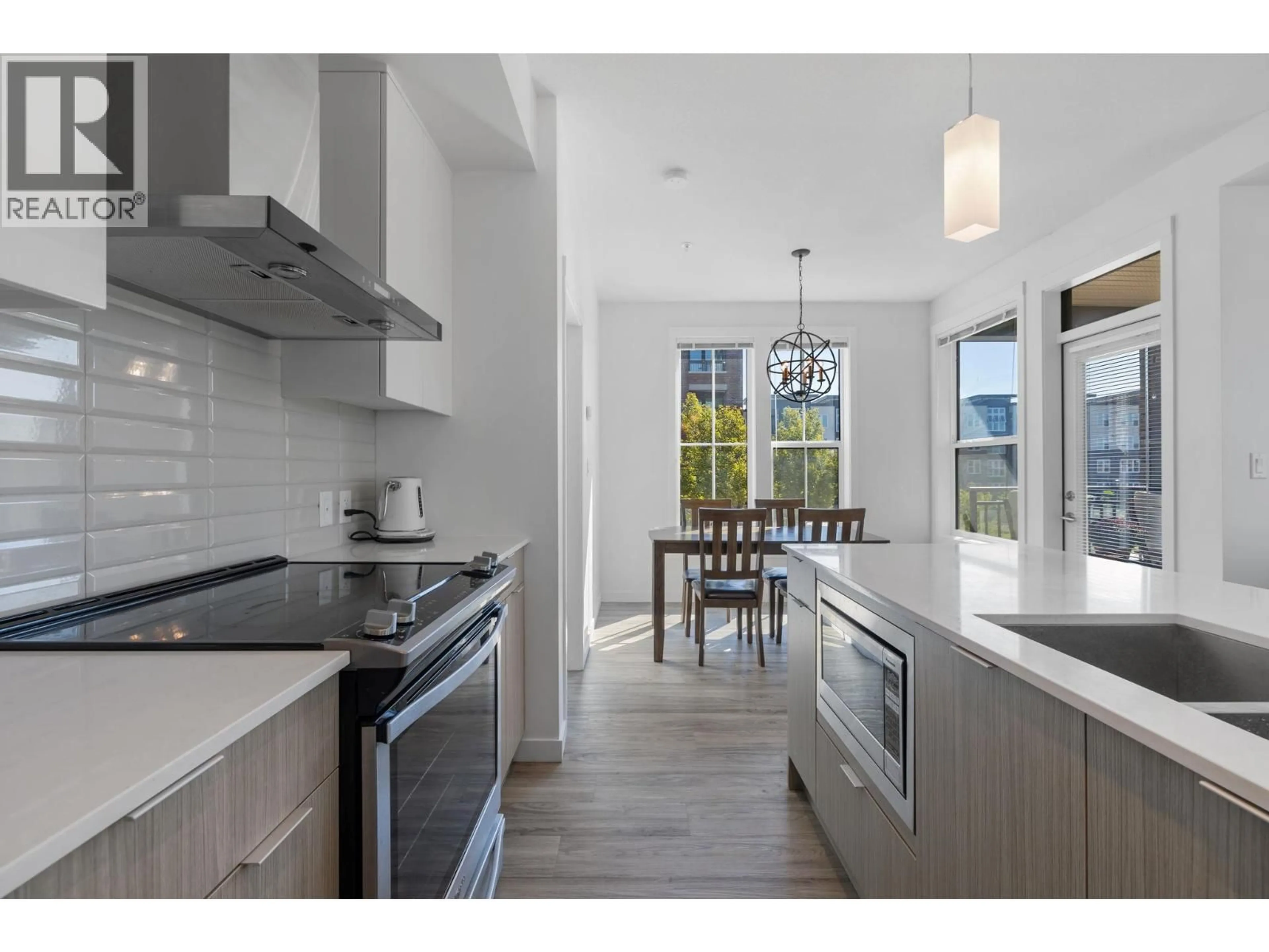 Open concept kitchen, ceramic/tile floor for 221 - 1775 CHAPMAN PLACE, Kelowna British Columbia V1Y0G3