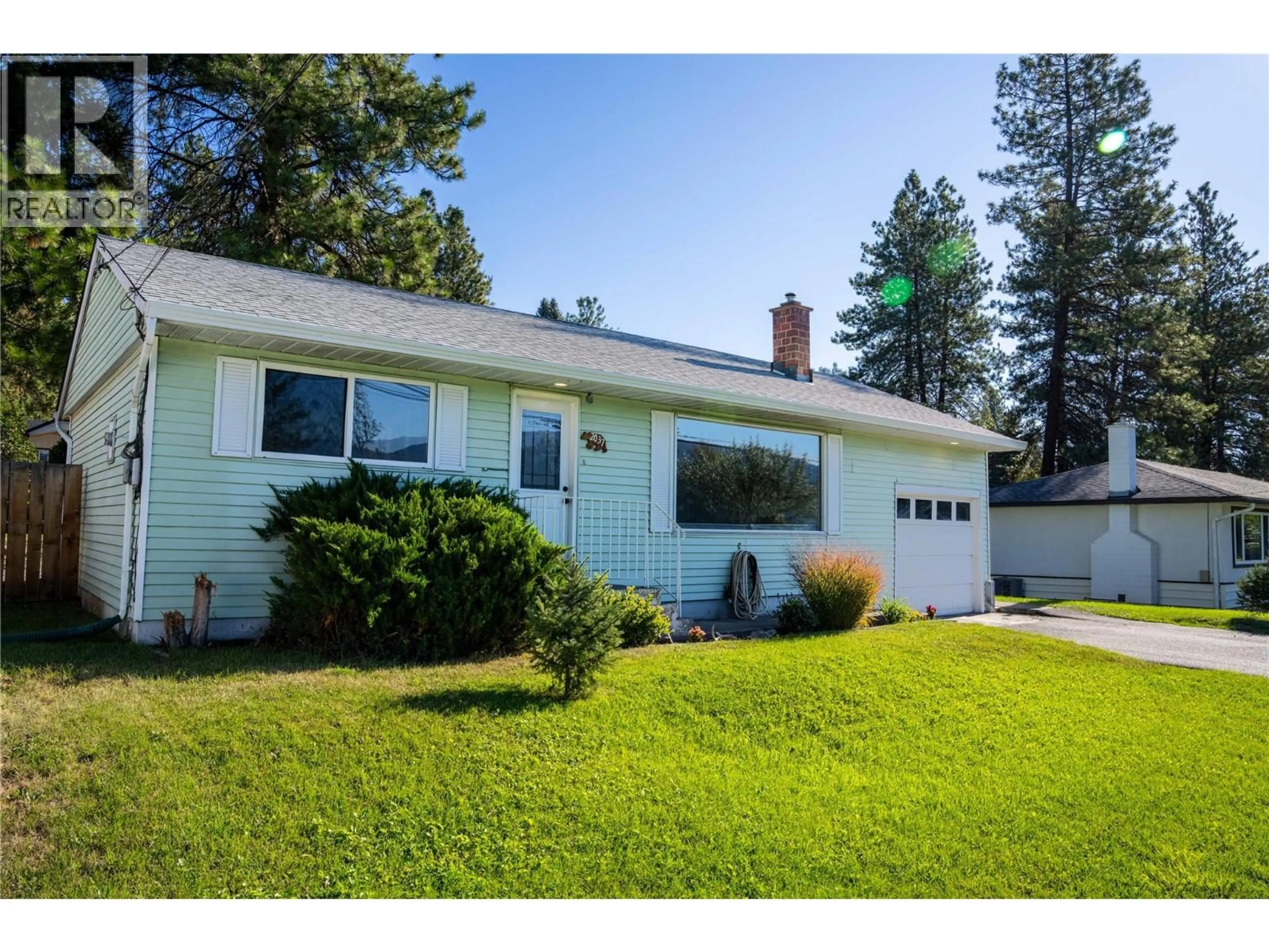 Home with vinyl exterior material, street for 2037 PARKER DRIVE, Merritt British Columbia V1K1J2