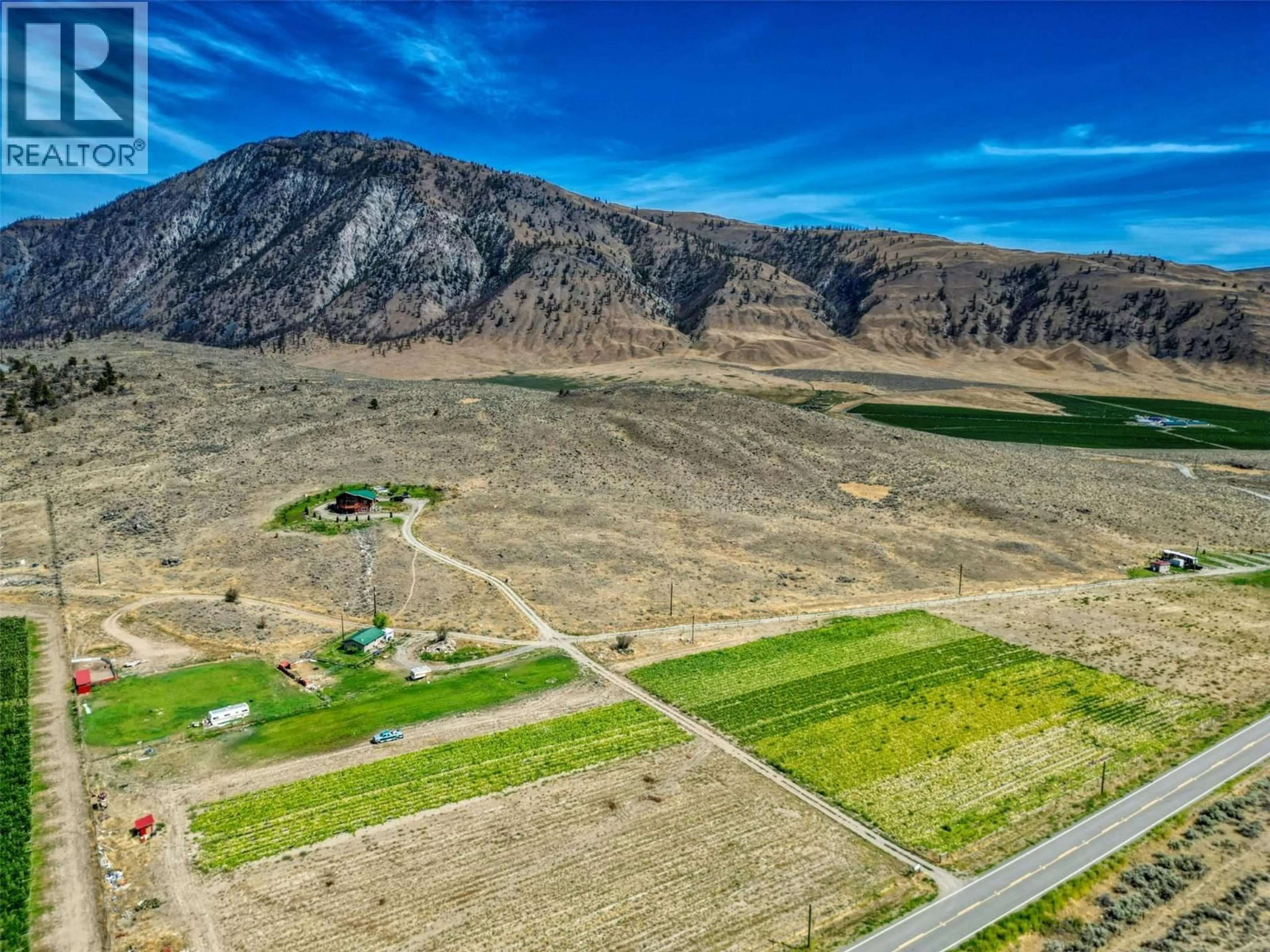 A pic from outside/outdoor area/front of a property/back of a property/a pic from drone, mountain view for 150 NIGHTHAWK ROAD, Cawston British Columbia V0X1C3