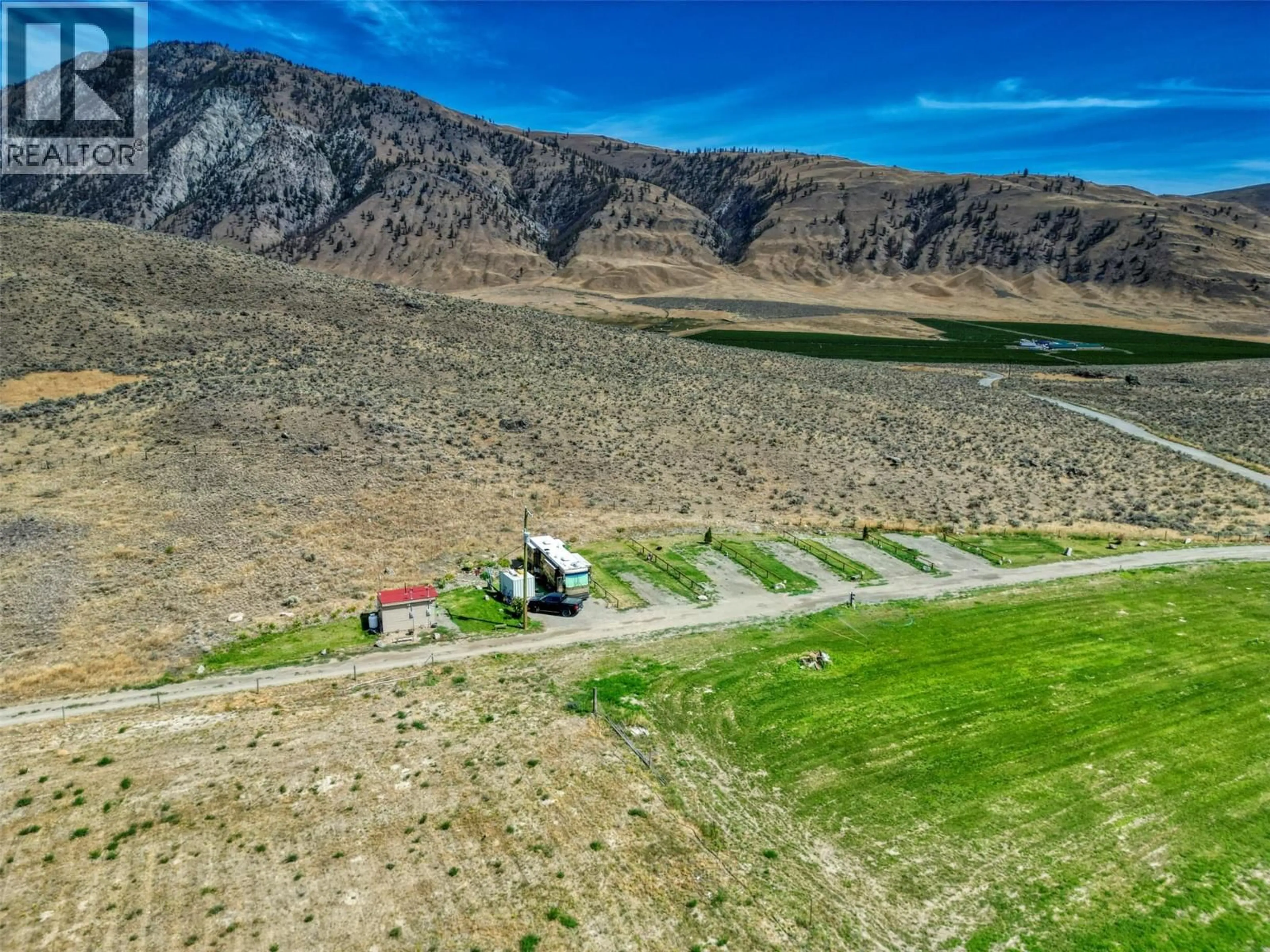A pic from outside/outdoor area/front of a property/back of a property/a pic from drone, mountain view for 150 NIGHTHAWK ROAD, Cawston British Columbia V0X1C3