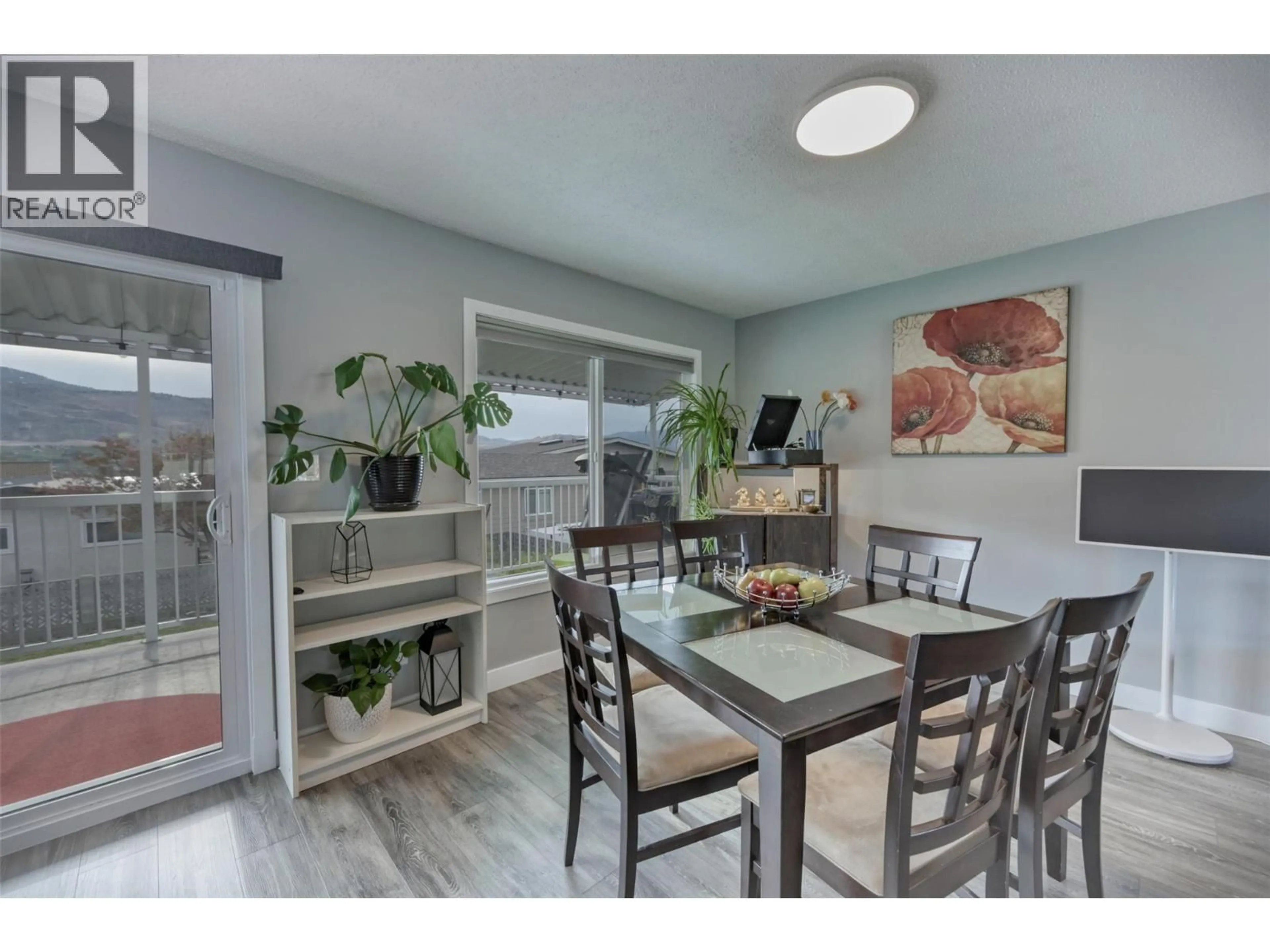 Dining room, wood/laminate floor for 3 KILLDEER PLACE, Osoyoos British Columbia V0H1V5