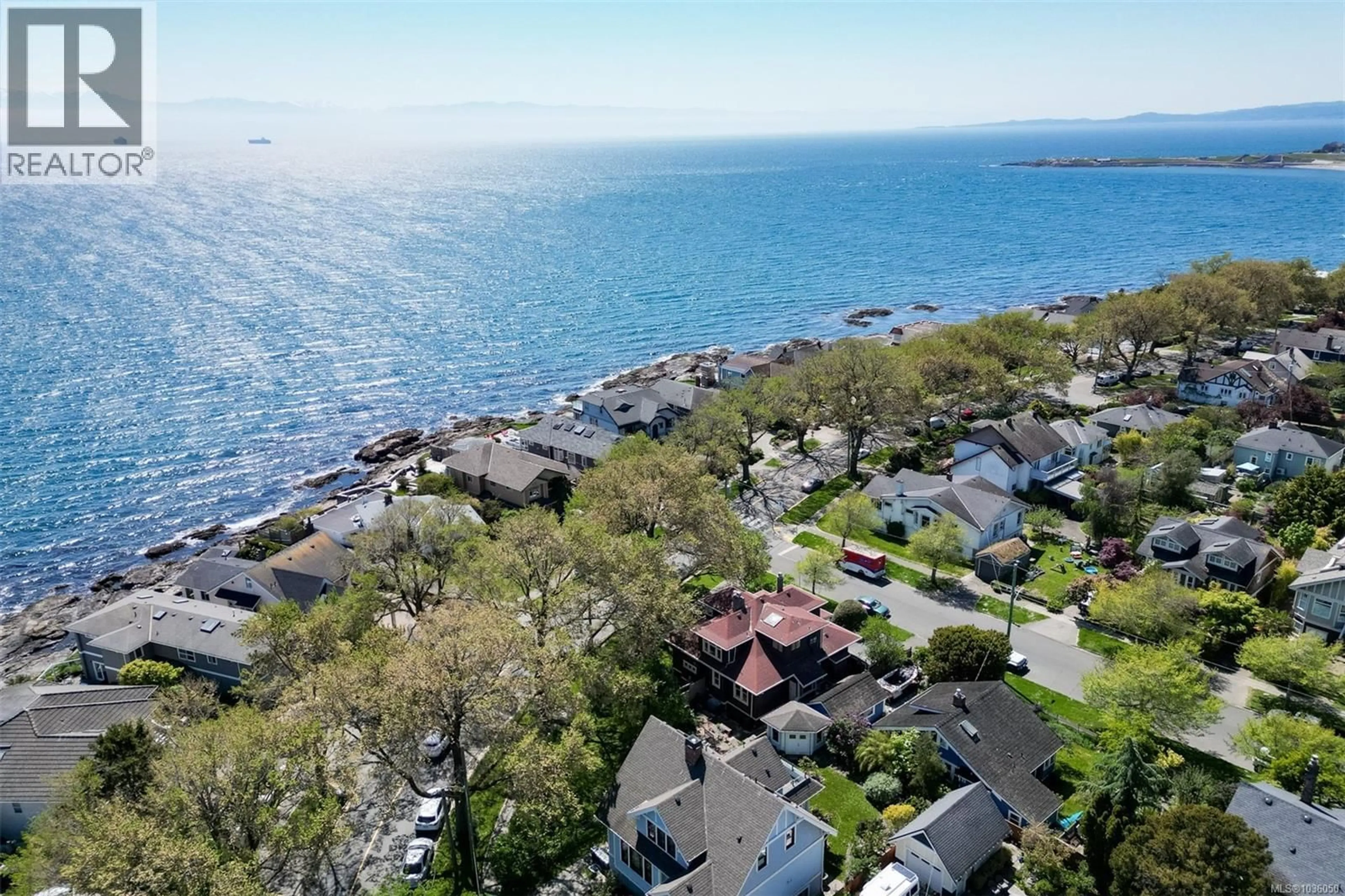 A pic from outside/outdoor area/front of a property/back of a property/a pic from drone, water/lake/river/ocean view for 1802 HOLLYWOOD CRESCENT, Victoria British Columbia V8S1J5