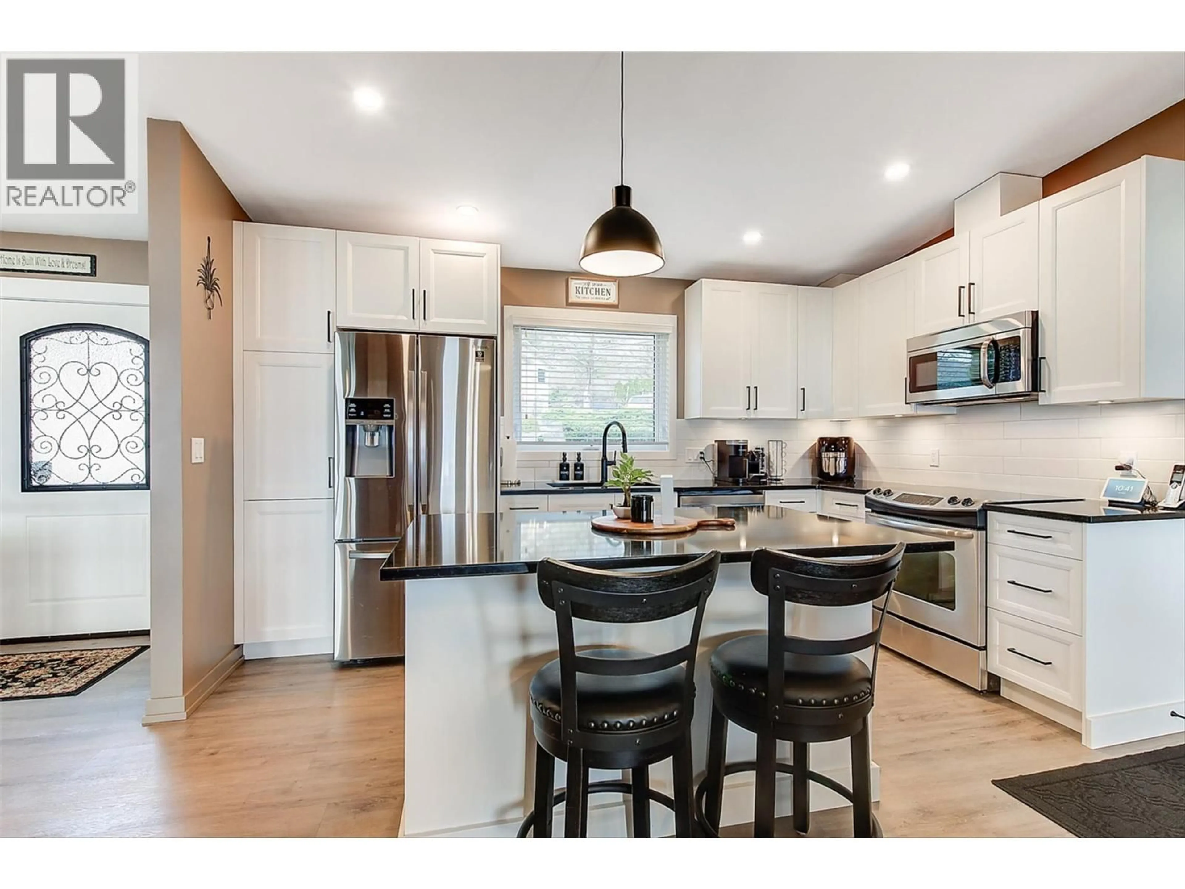 Open concept kitchen, unknown for 4147 PONDEROSA DRIVE, Peachland British Columbia V0H1X5