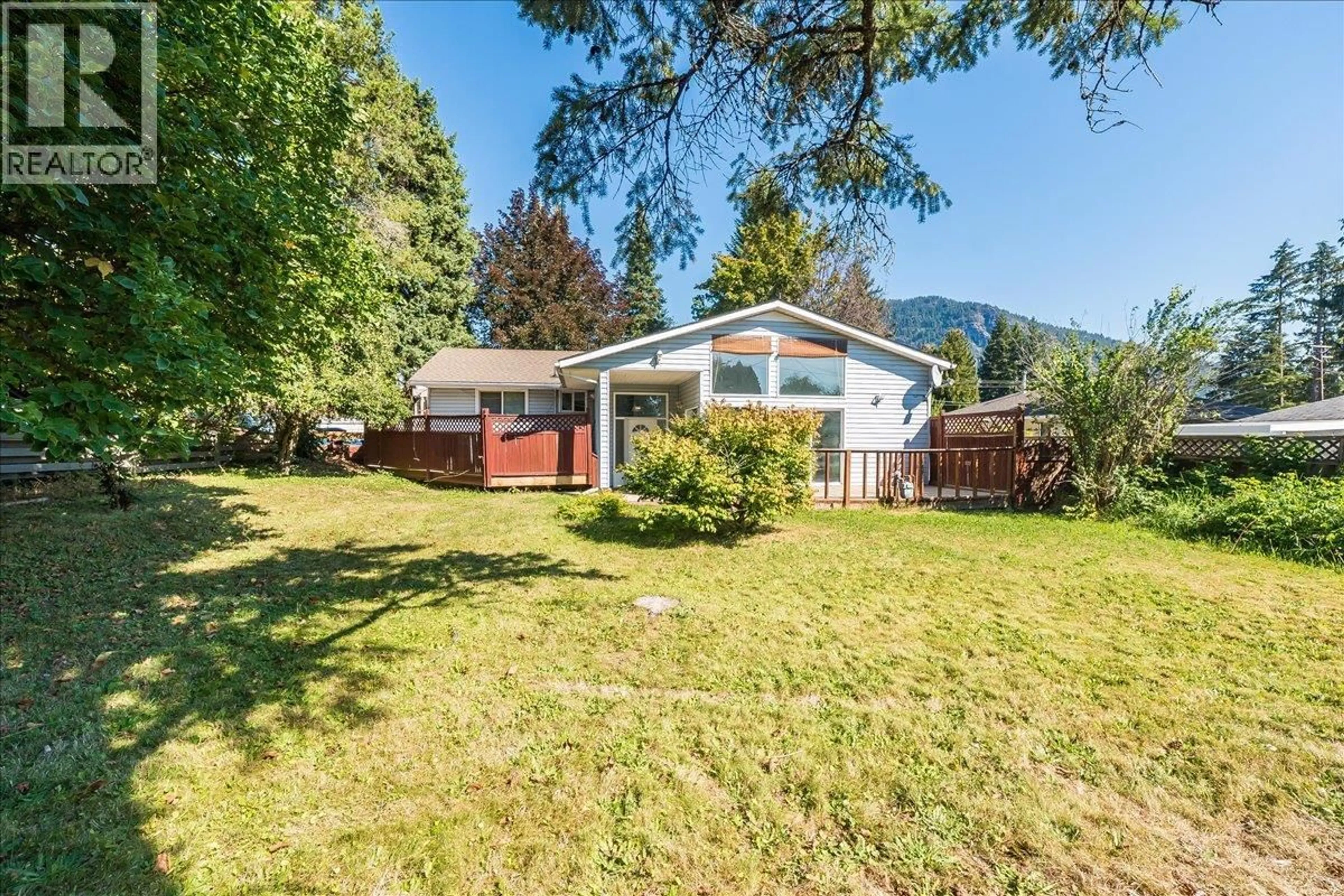 A pic from outside/outdoor area/front of a property/back of a property/a pic from drone, mountain view for 708 10TH STREET, Castlegar British Columbia V1N2H8