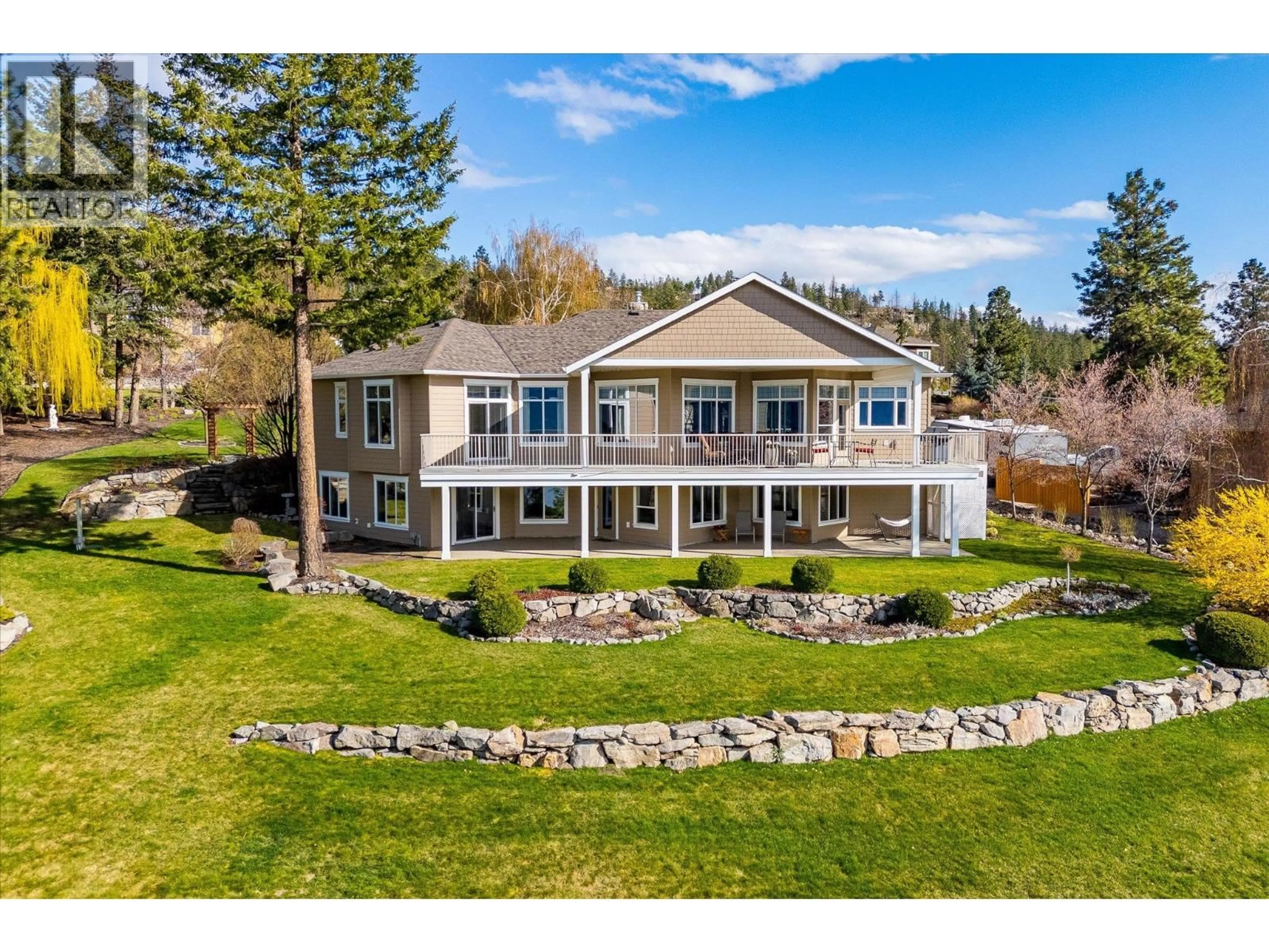 A pic from outside/outdoor area/front of a property/back of a property/a pic from drone, water/lake/river/ocean view for 60 - 10726 NIGHTHAWK ROAD, Lake Country British Columbia V4V2K7