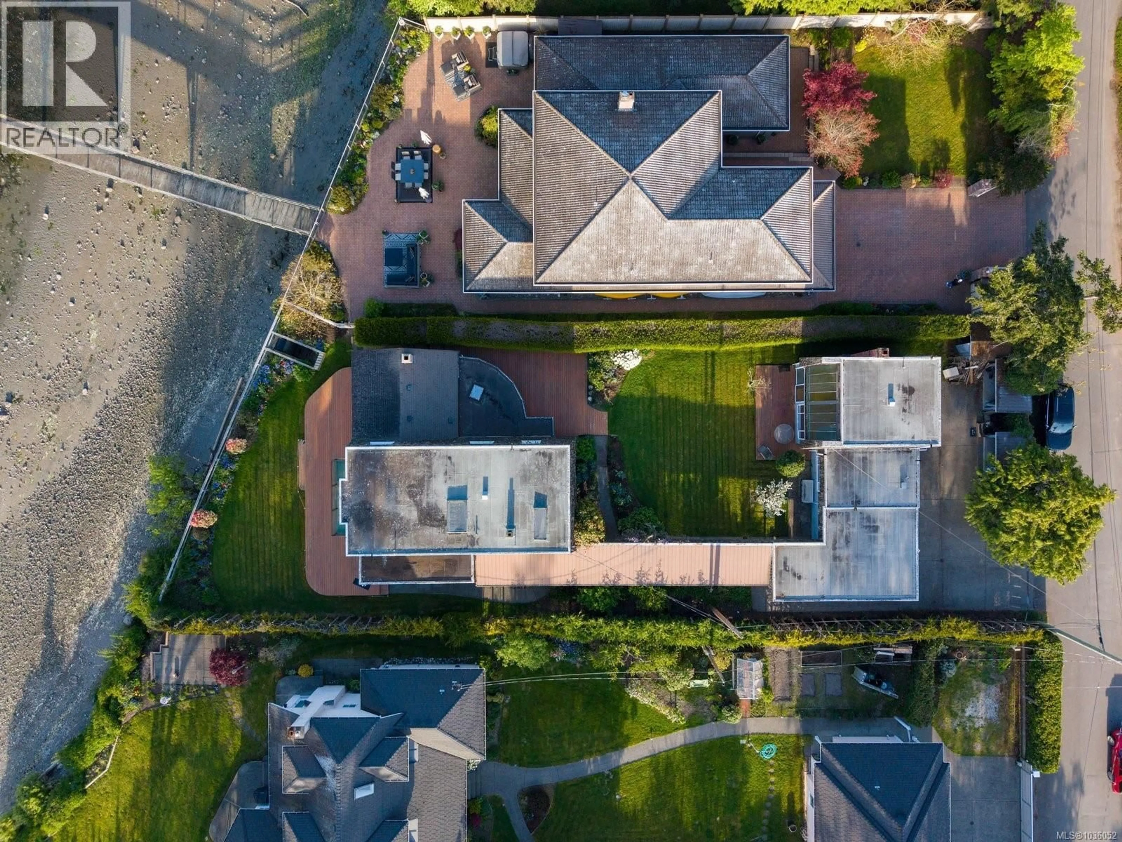 A pic from outside/outdoor area/front of a property/back of a property/a pic from drone, street for 2444 WHIDBY LANE, Sidney British Columbia V8L2K3