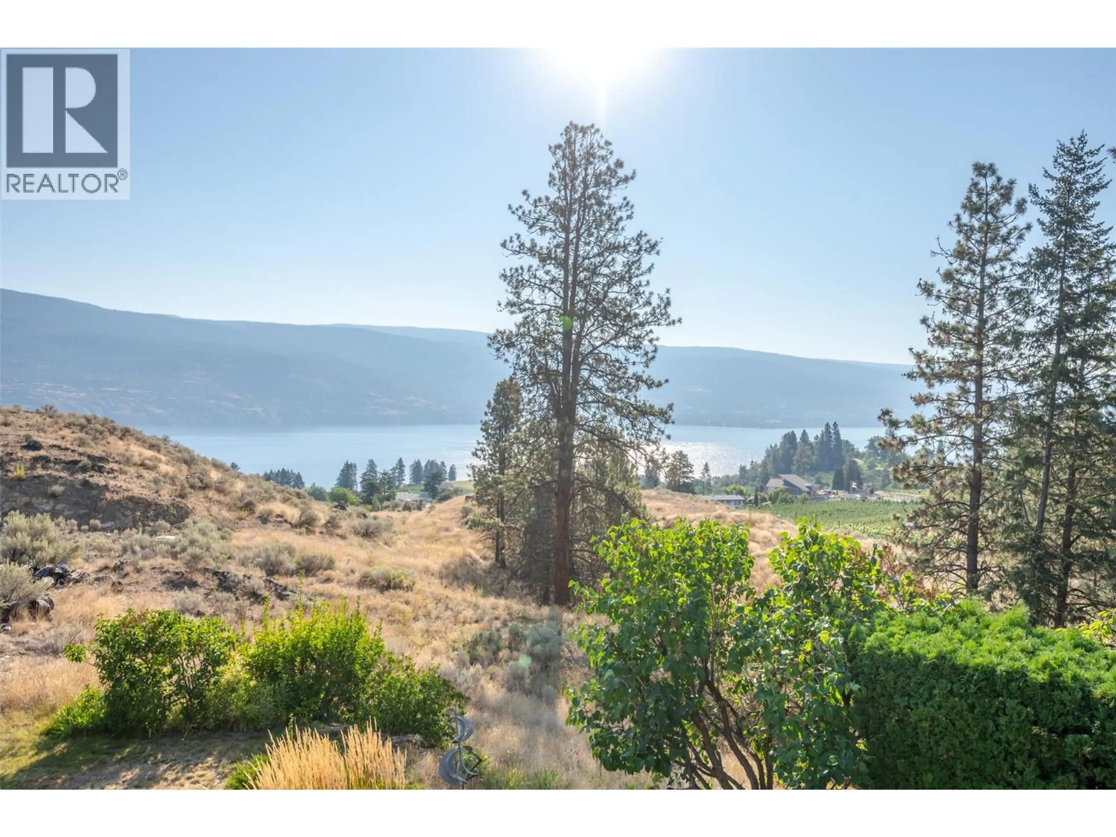 A pic from outside/outdoor area/front of a property/back of a property/a pic from drone, water/lake/river/ocean view for 150 SUMAC RIDGE DRIVE, Summerland British Columbia V0H1Z6
