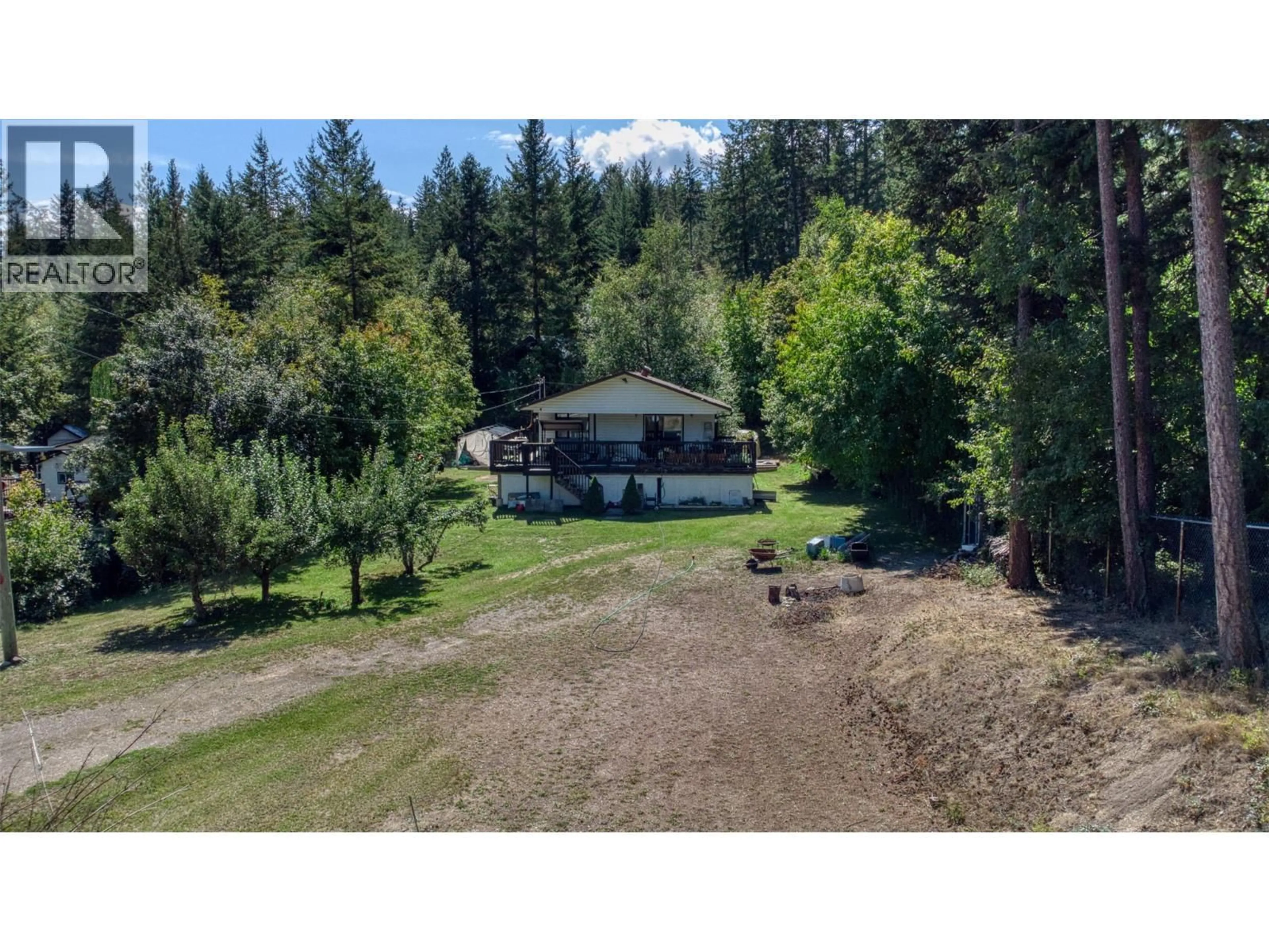 A pic from outside/outdoor area/front of a property/back of a property/a pic from drone, forest/trees view for 771 FIRWOOD ROAD, Kelowna British Columbia V1Z3V5