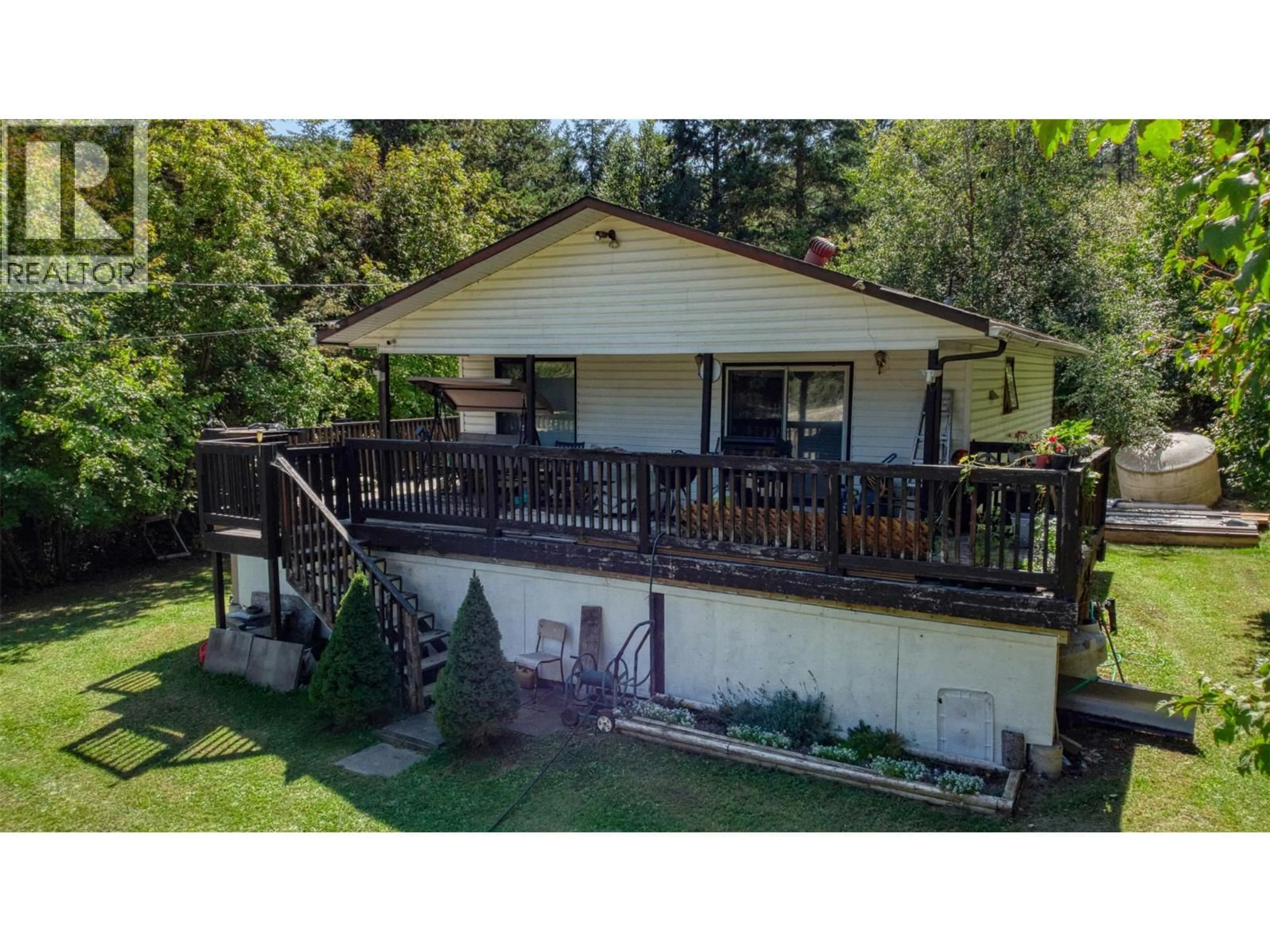 A pic from outside/outdoor area/front of a property/back of a property/a pic from drone, water/lake/river/ocean view for 771 FIRWOOD ROAD, Kelowna British Columbia V1Z3V5