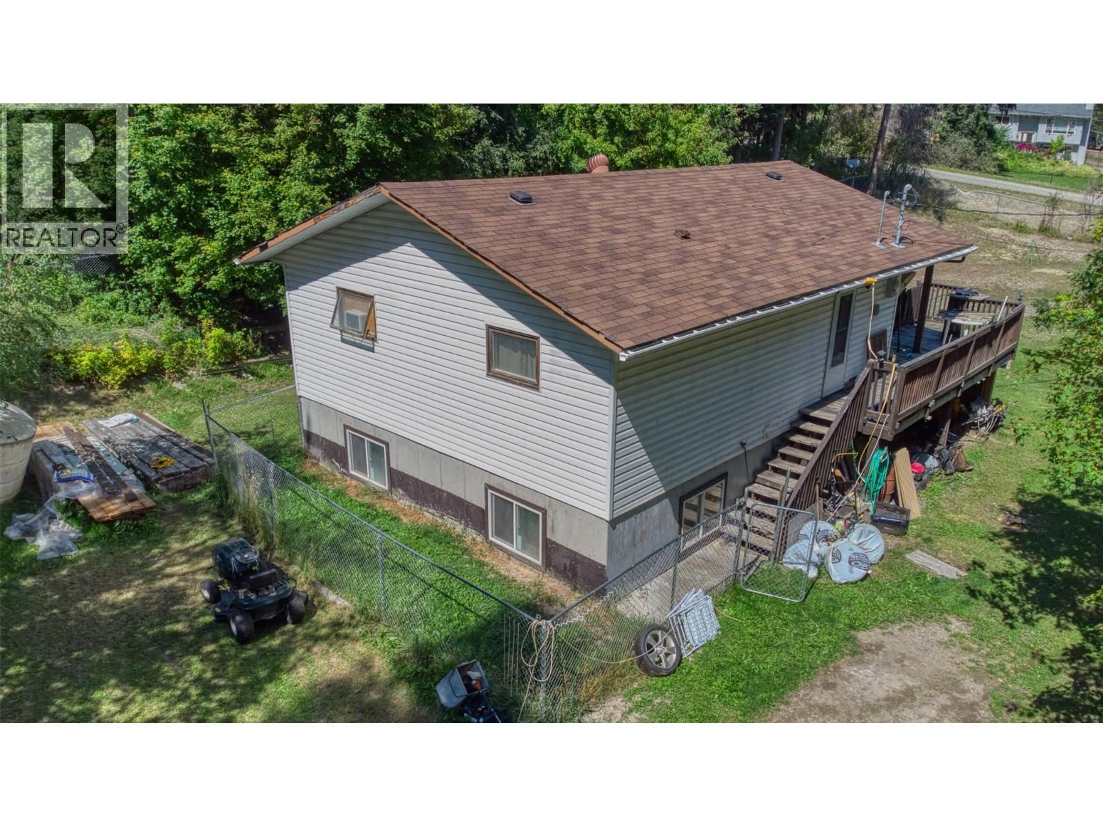 A pic from outside/outdoor area/front of a property/back of a property/a pic from drone, building for 771 FIRWOOD ROAD, Kelowna British Columbia V1Z3V5