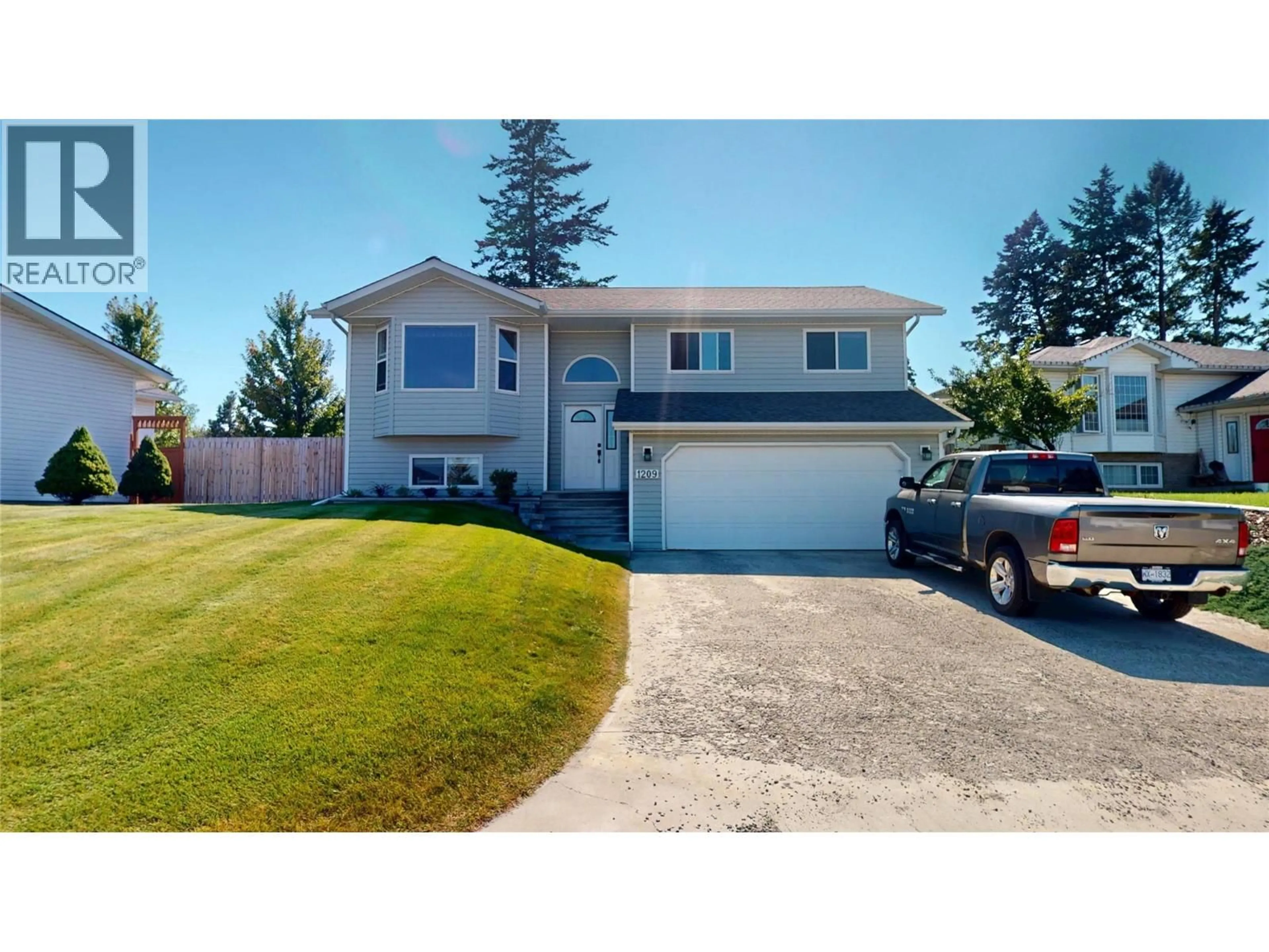 Home with vinyl exterior material, street for 1209 13TH STREET SOUTH, Cranbrook British Columbia V1C6M6