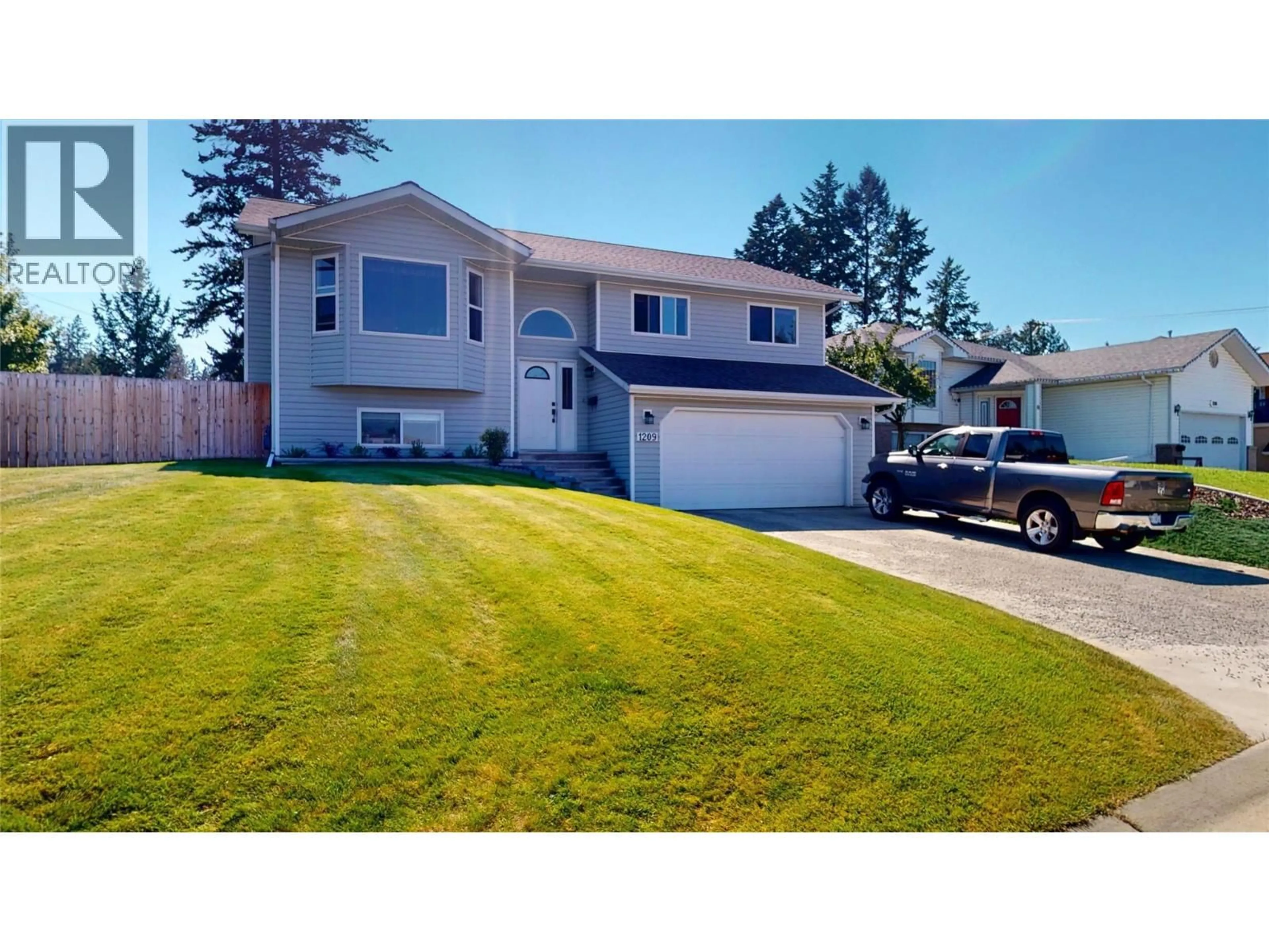 Home with vinyl exterior material, street for 1209 13TH STREET SOUTH, Cranbrook British Columbia V1C6M6