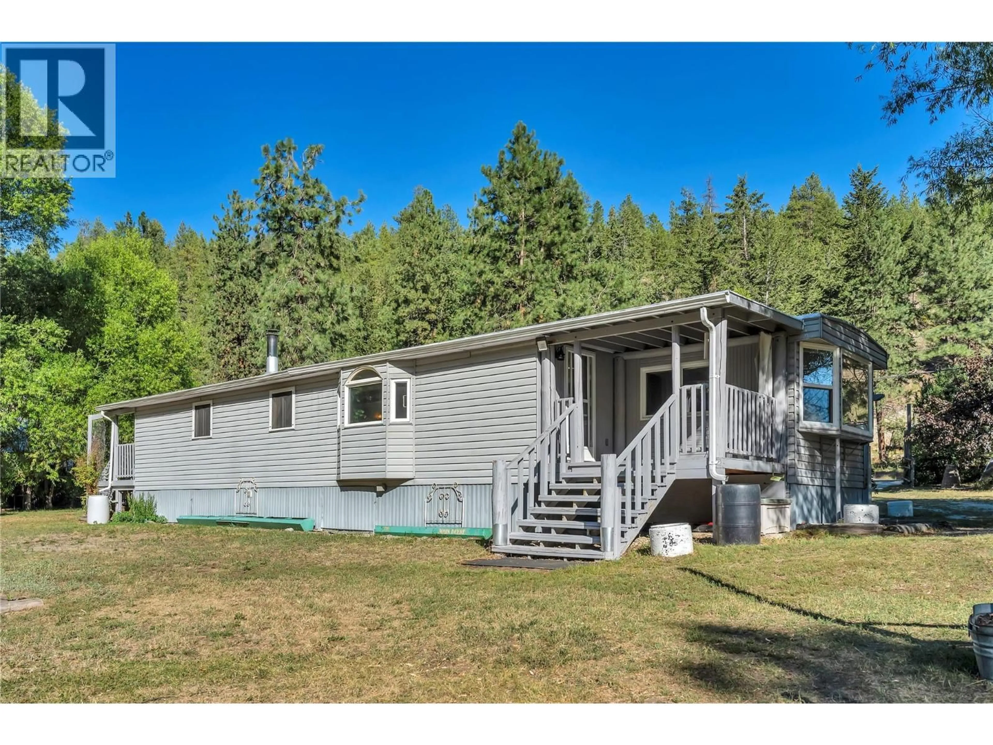 Home with vinyl exterior material, unknown for 140 FISH LAKE ROAD, Summerland British Columbia V0H1Z8