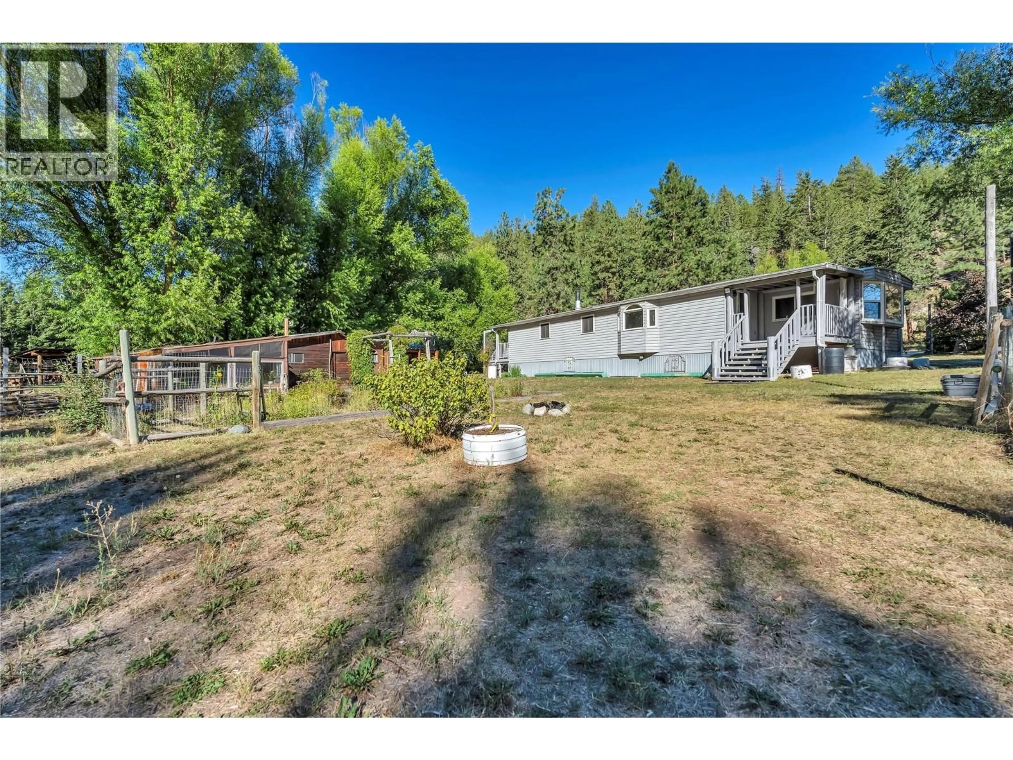 A pic from outside/outdoor area/front of a property/back of a property/a pic from drone, unknown for 140 FISH LAKE ROAD, Summerland British Columbia V0H1Z8