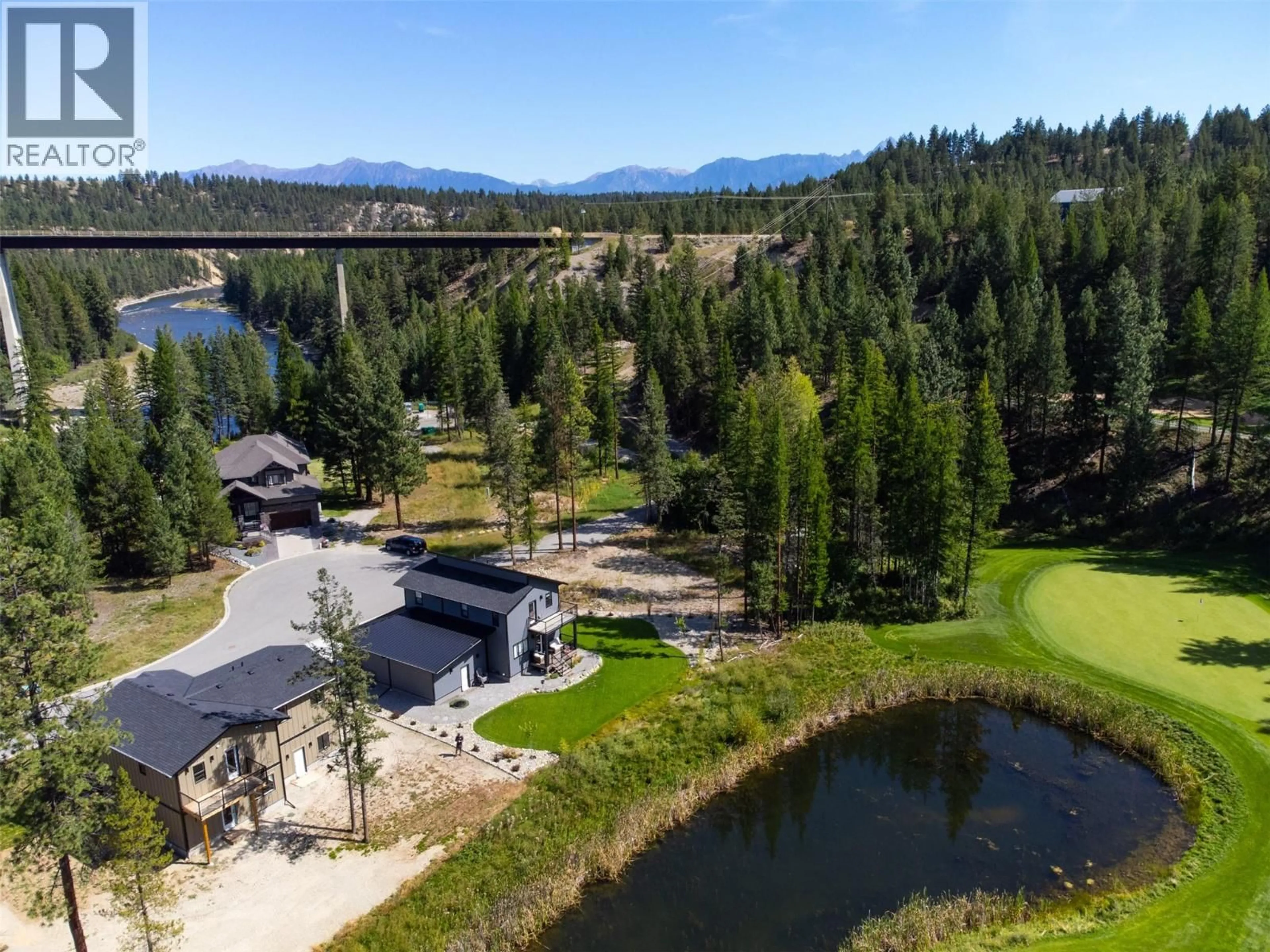 A pic from outside/outdoor area/front of a property/back of a property/a pic from drone, water/lake/river/ocean view for 109 RIVER DRIVE, Cranbrook British Columbia V1C0C6