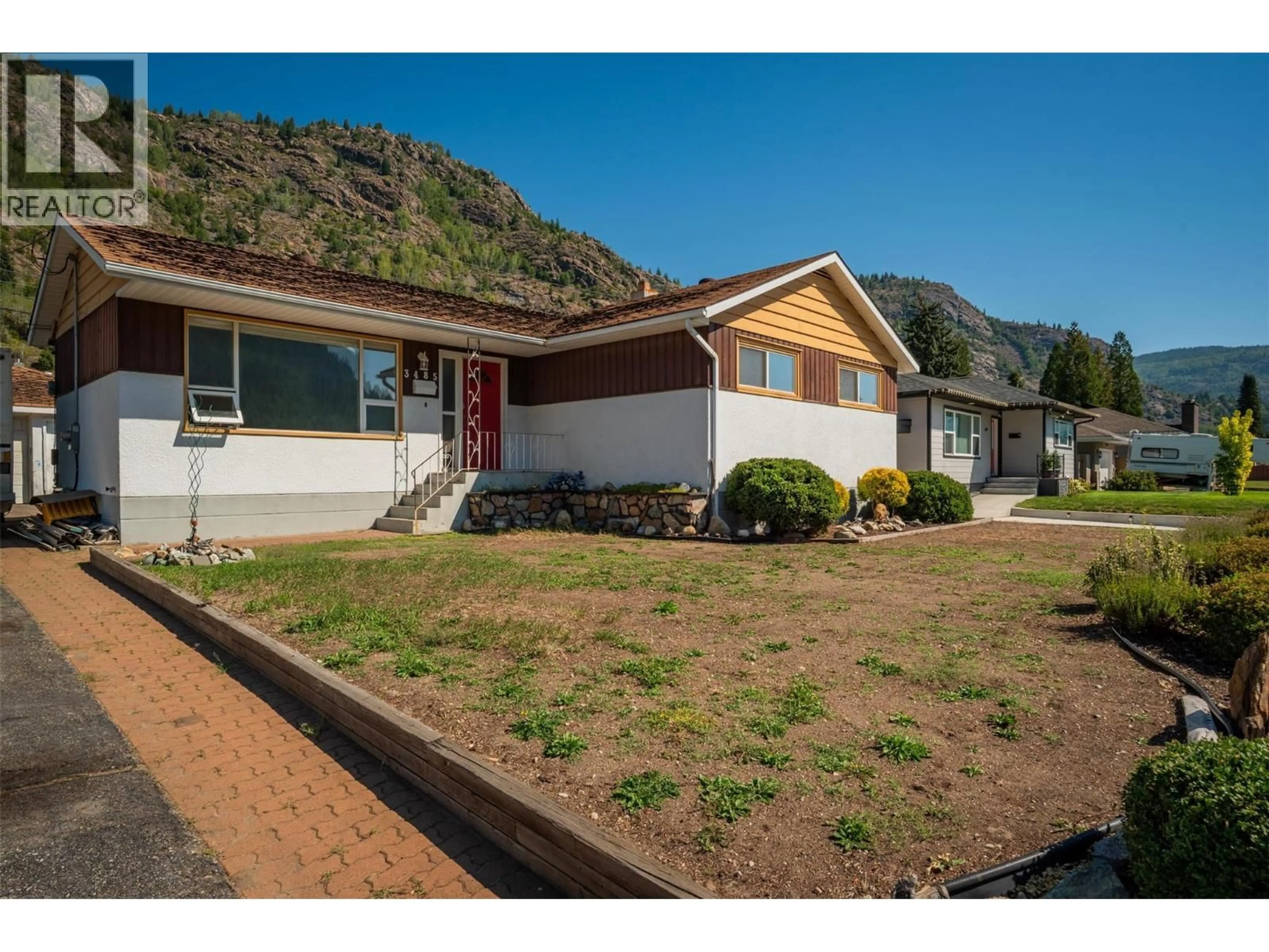 Home with vinyl exterior material, mountain view for 3485 MARIGOLD DRIVE, Trail British Columbia V1R2X7