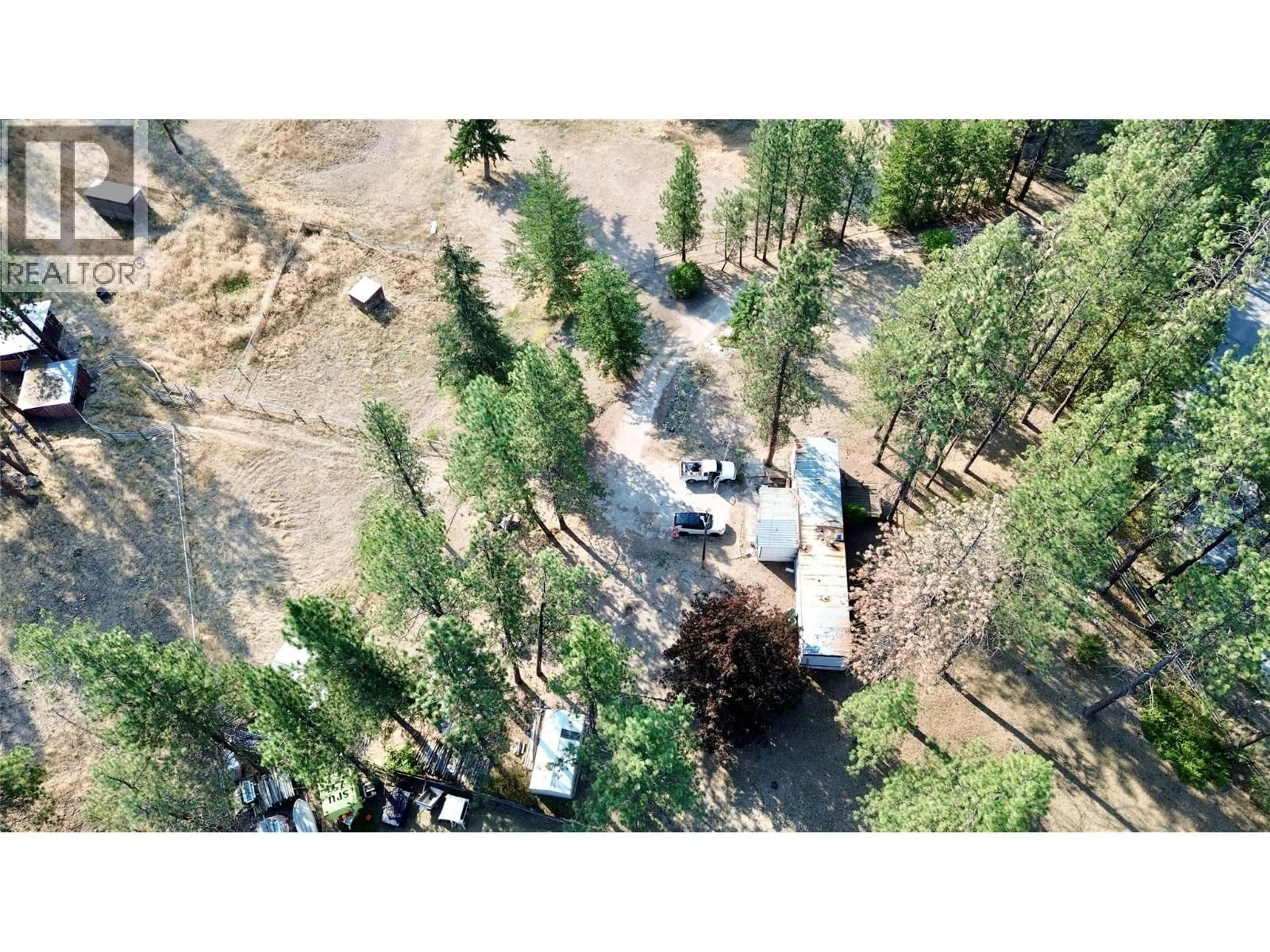A pic from outside/outdoor area/front of a property/back of a property/a pic from drone, forest/trees view for 871 GREEN LAKE ROAD, Oliver British Columbia V0H1T5