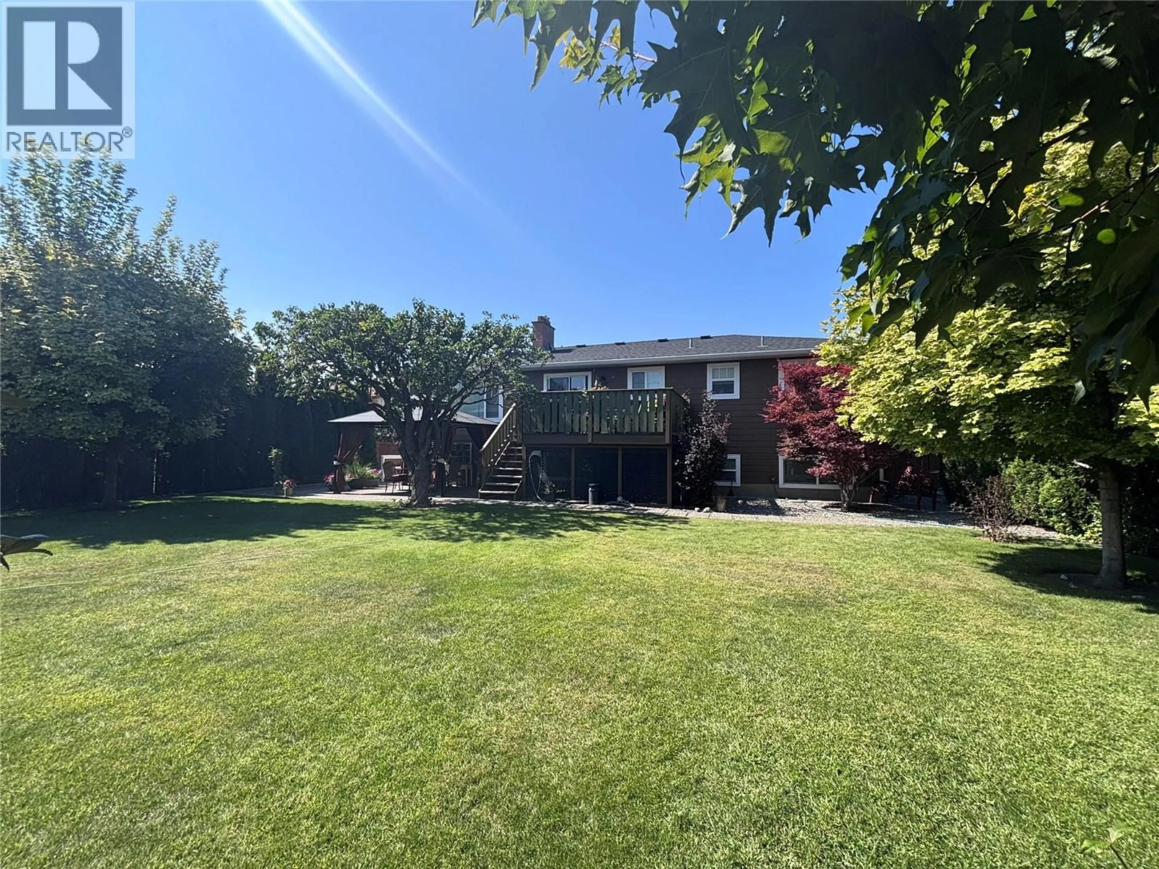 A pic from outside/outdoor area/front of a property/back of a property/a pic from drone, unknown for 909 STARDUST STREET, Kamloops British Columbia V2B4C6