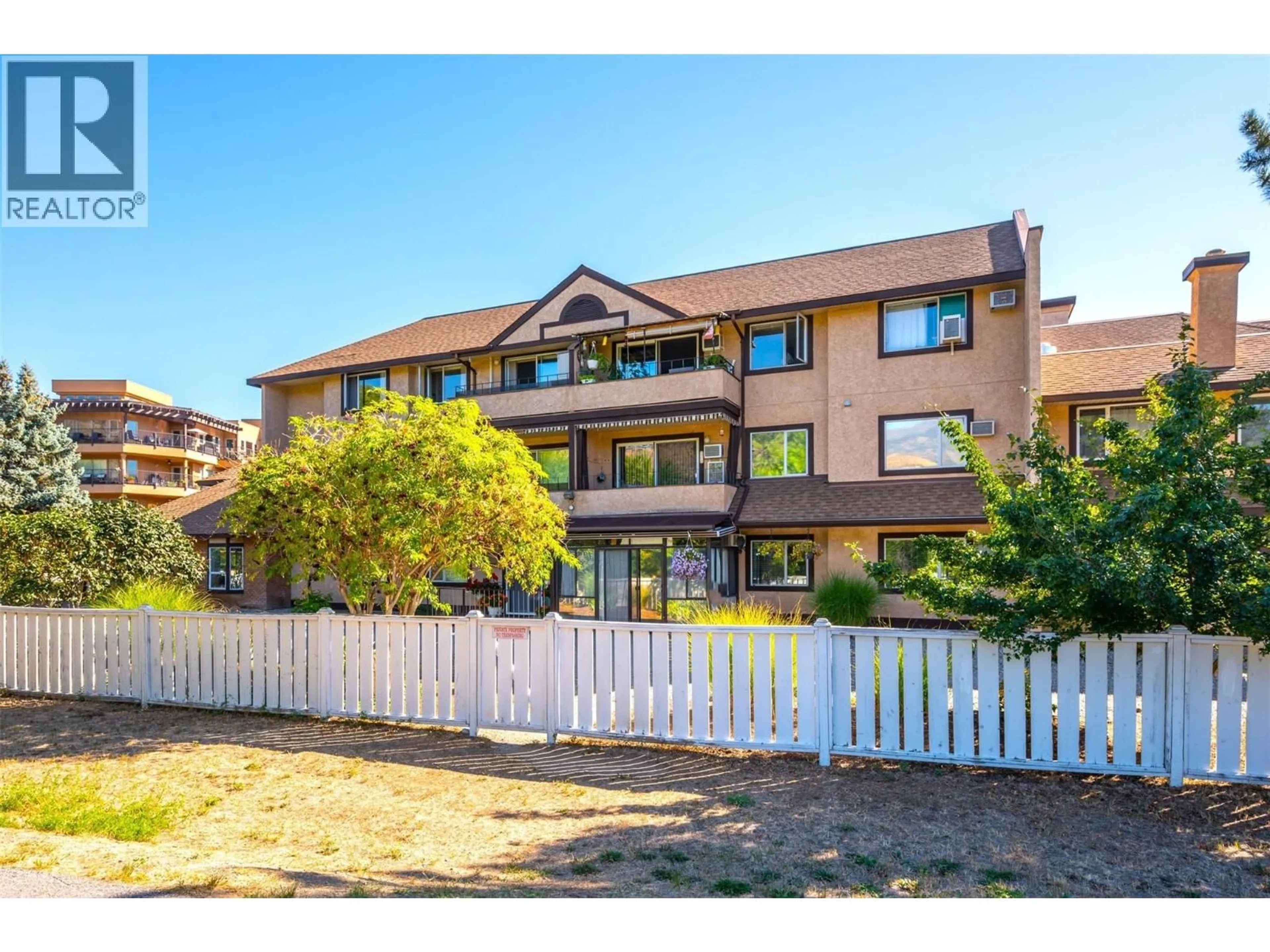 A pic from outside/outdoor area/front of a property/back of a property/a pic from drone, mountain view for 111 - 337 MCKINNEY ROAD, Oliver British Columbia V0H1T3
