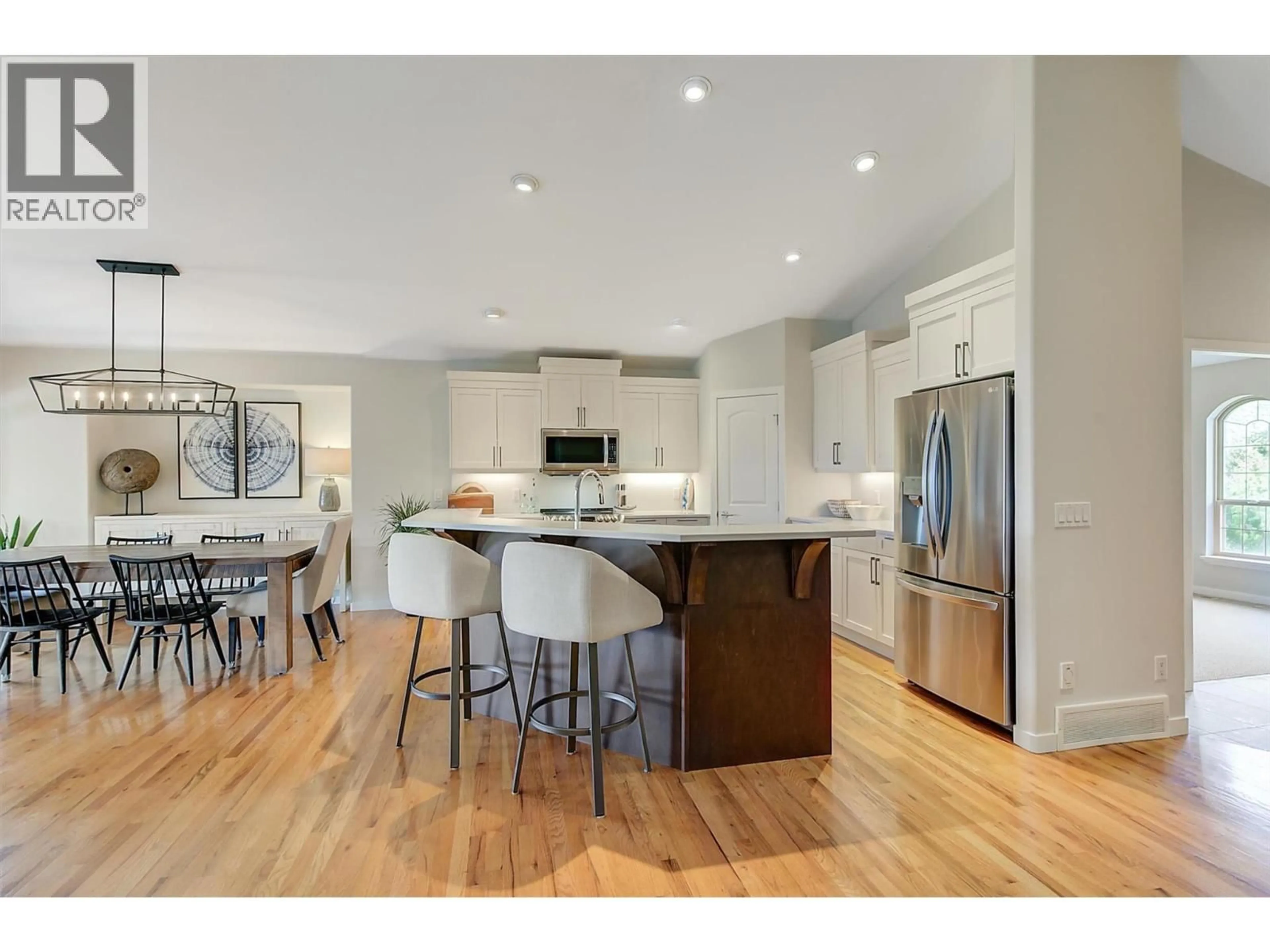 Open concept kitchen, wood/laminate floor for 2497 WILD HORSE DRIVE, West Kelowna British Columbia V4T2Y4