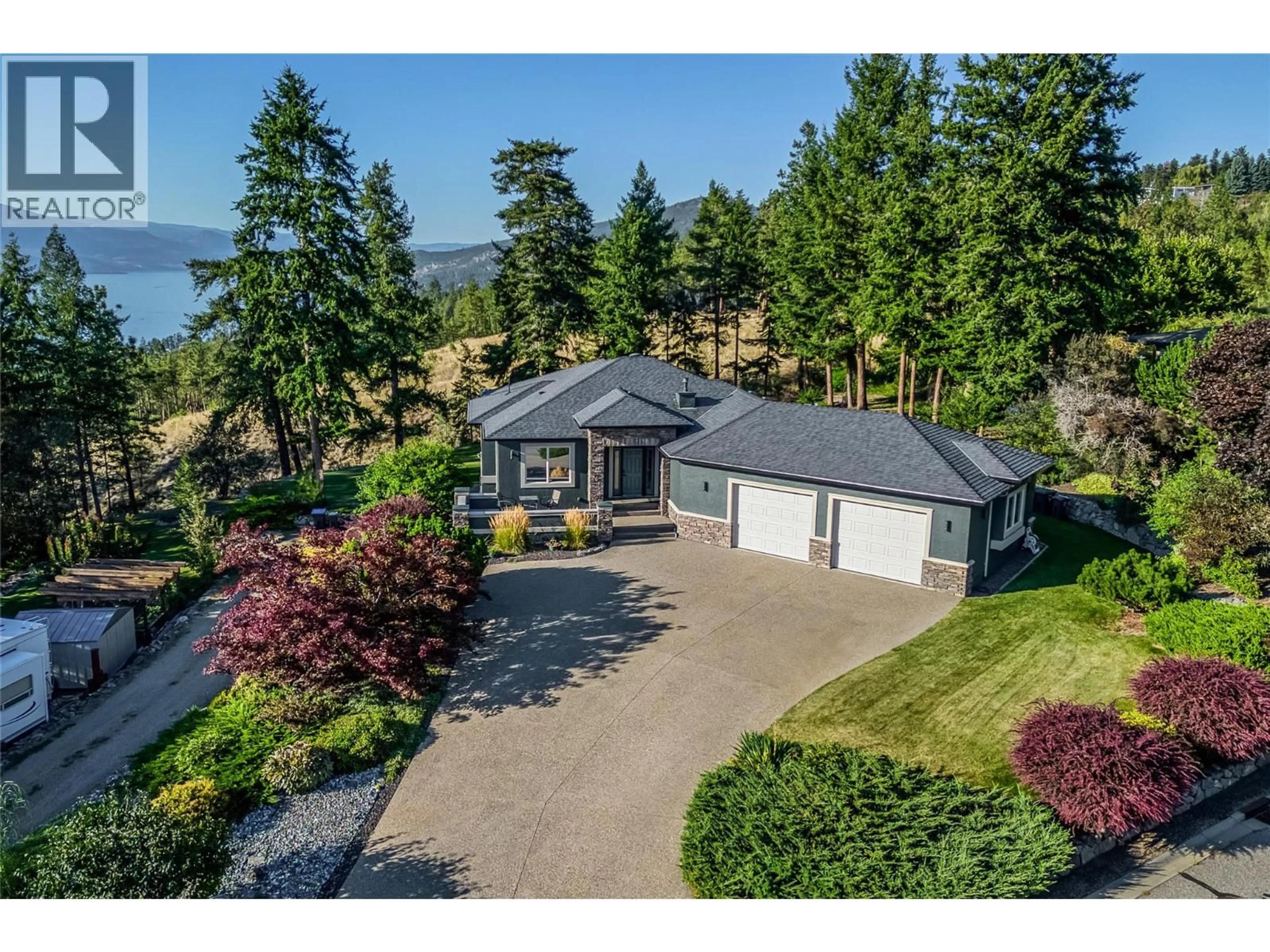 A pic from outside/outdoor area/front of a property/back of a property/a pic from drone, unknown for 70 - 10726 NIGHTHAWK ROAD, Lake Country British Columbia V4V2K7