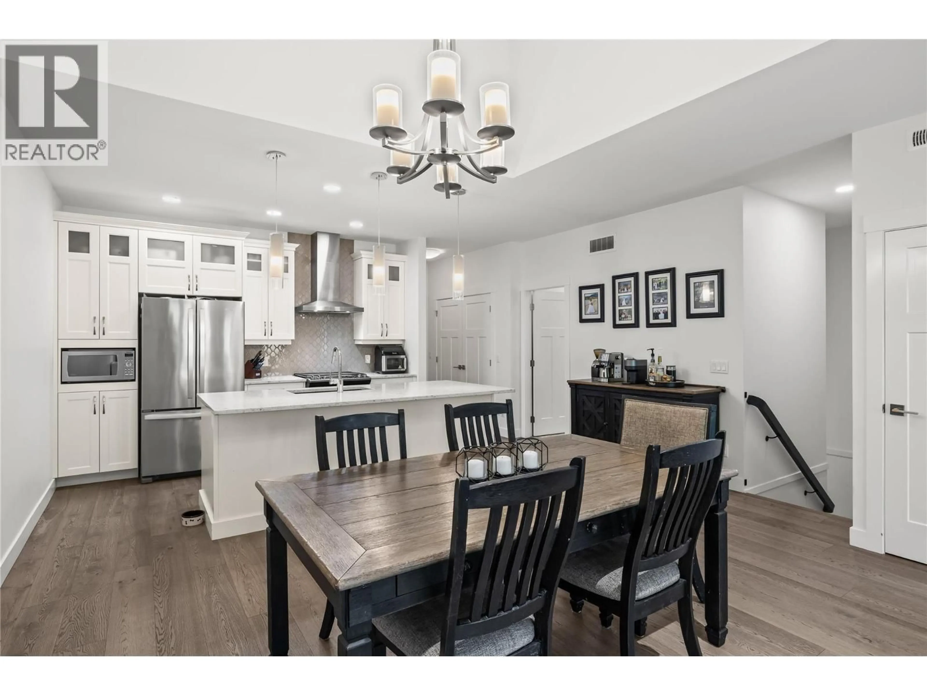 Open concept kitchen, wood/laminate floor for 42 - 1870 ROSEALEE LANE, West Kelowna British Columbia V1Z4E2
