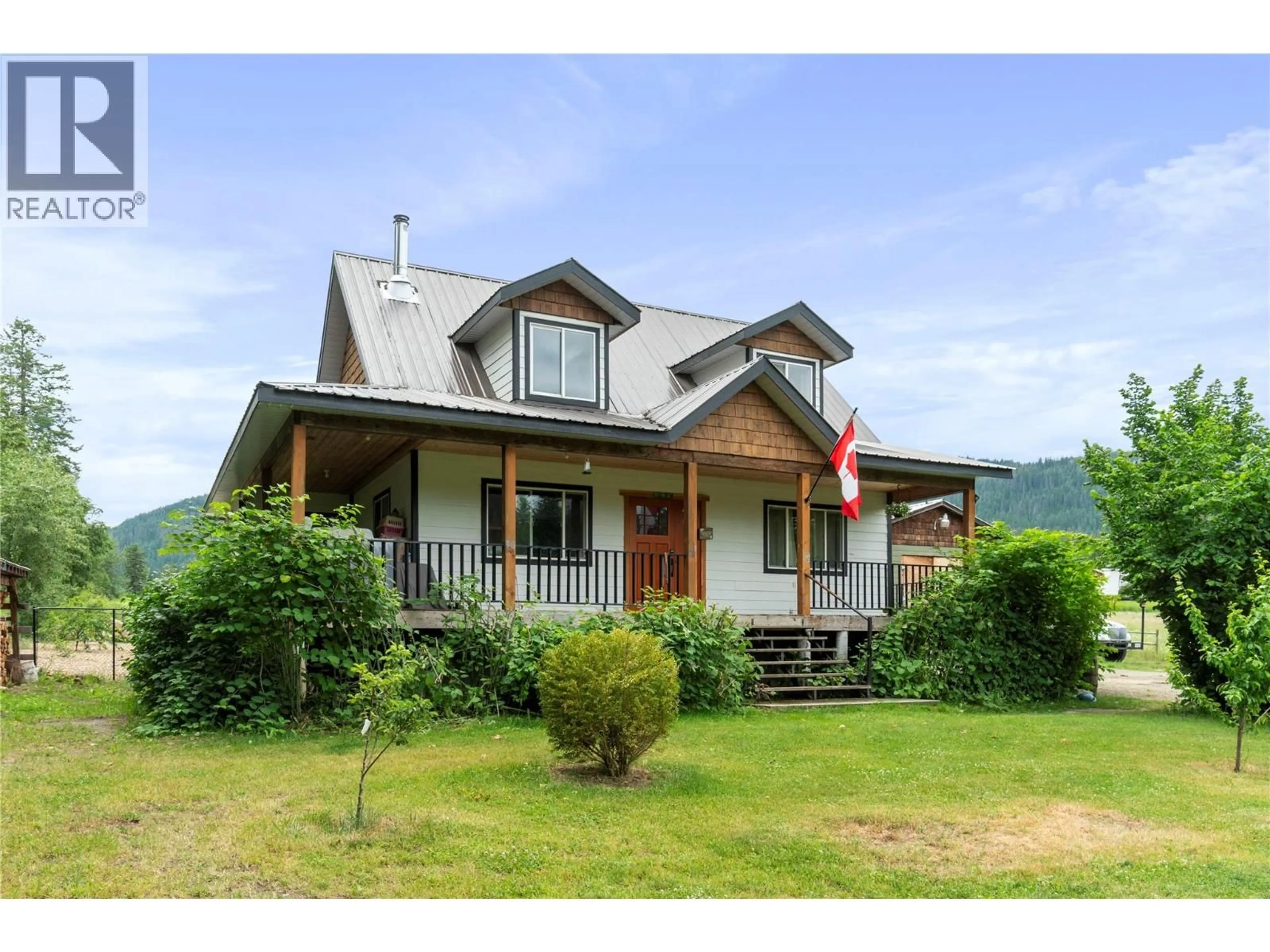 A pic from outside/outdoor area/front of a property/back of a property/a pic from drone, mountain view for 4150 20 AVENUE SOUTHEAST, Salmon Arm British Columbia V1E1X9