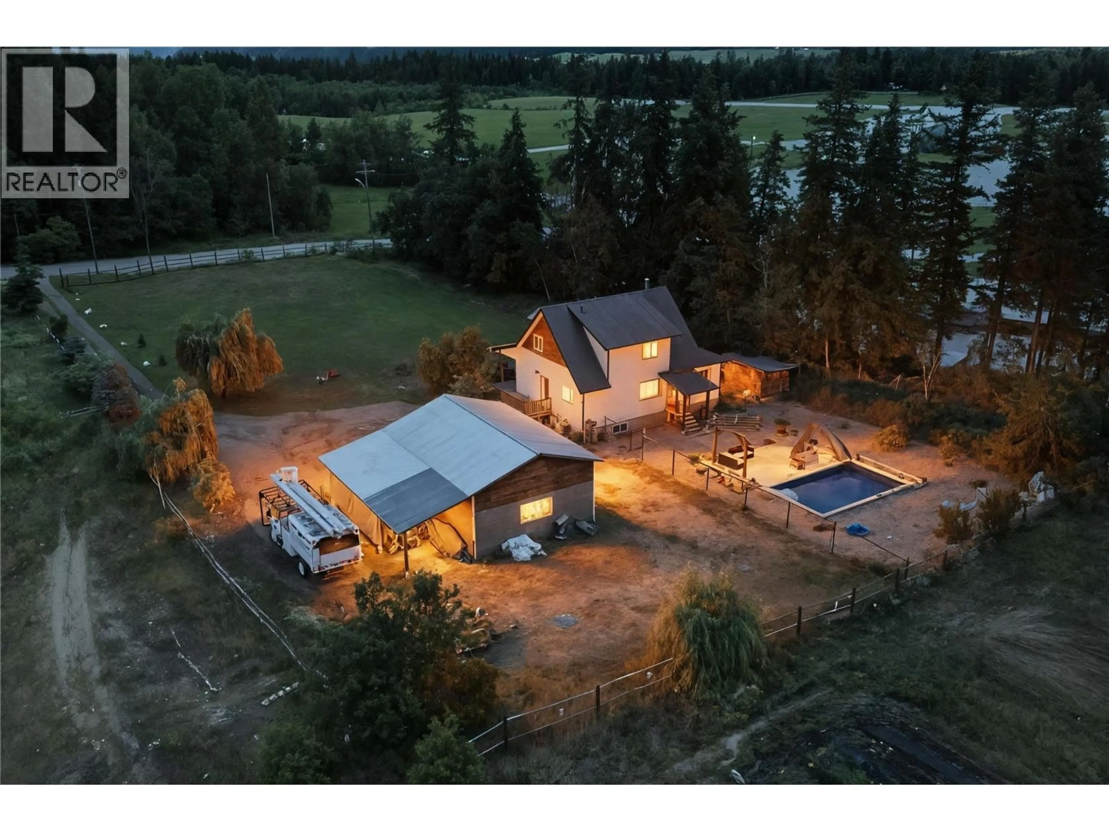 A pic from outside/outdoor area/front of a property/back of a property/a pic from drone, unknown for 4150 20 AVENUE SOUTHEAST, Salmon Arm British Columbia V1E1X9