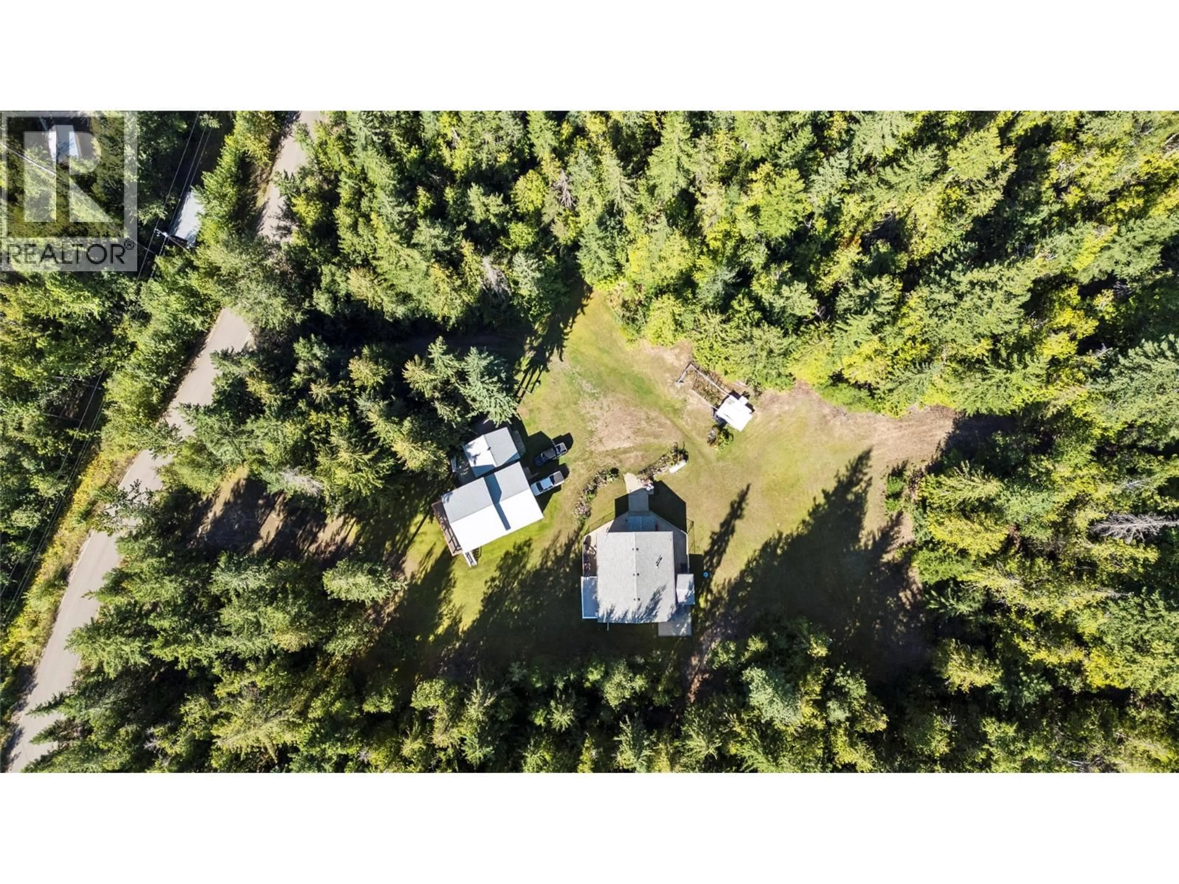 A pic from outside/outdoor area/front of a property/back of a property/a pic from drone, forest/trees view for 6803 MAGNA BAY DRIVE, Magna Bay British Columbia V0E1M7