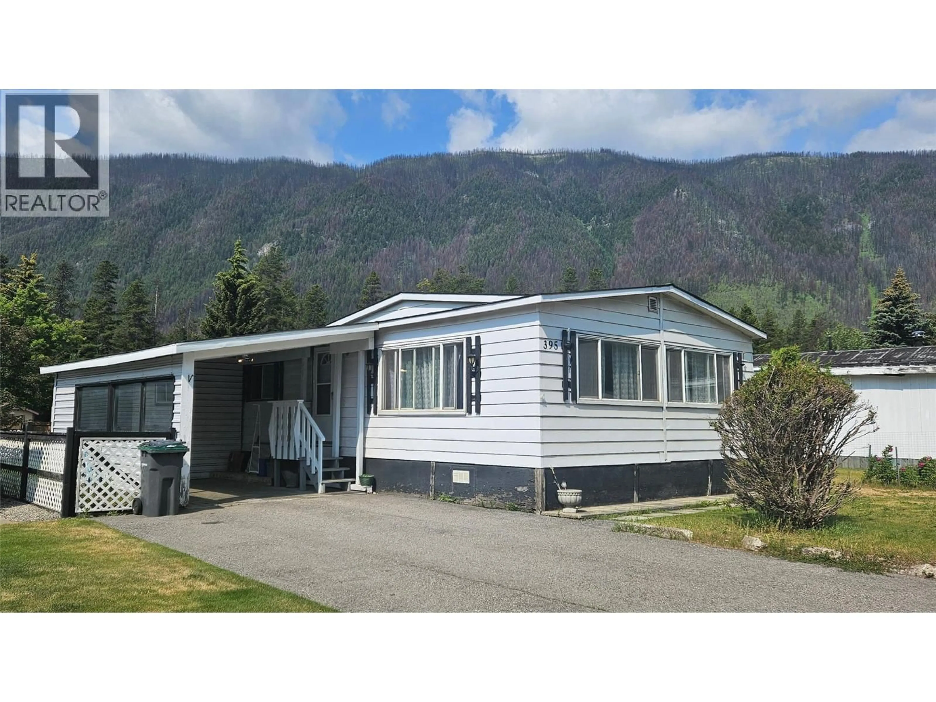 Home with vinyl exterior material, mountain view for 395 RED CEDAR CRESCENT, Sparwood British Columbia V0B2G0