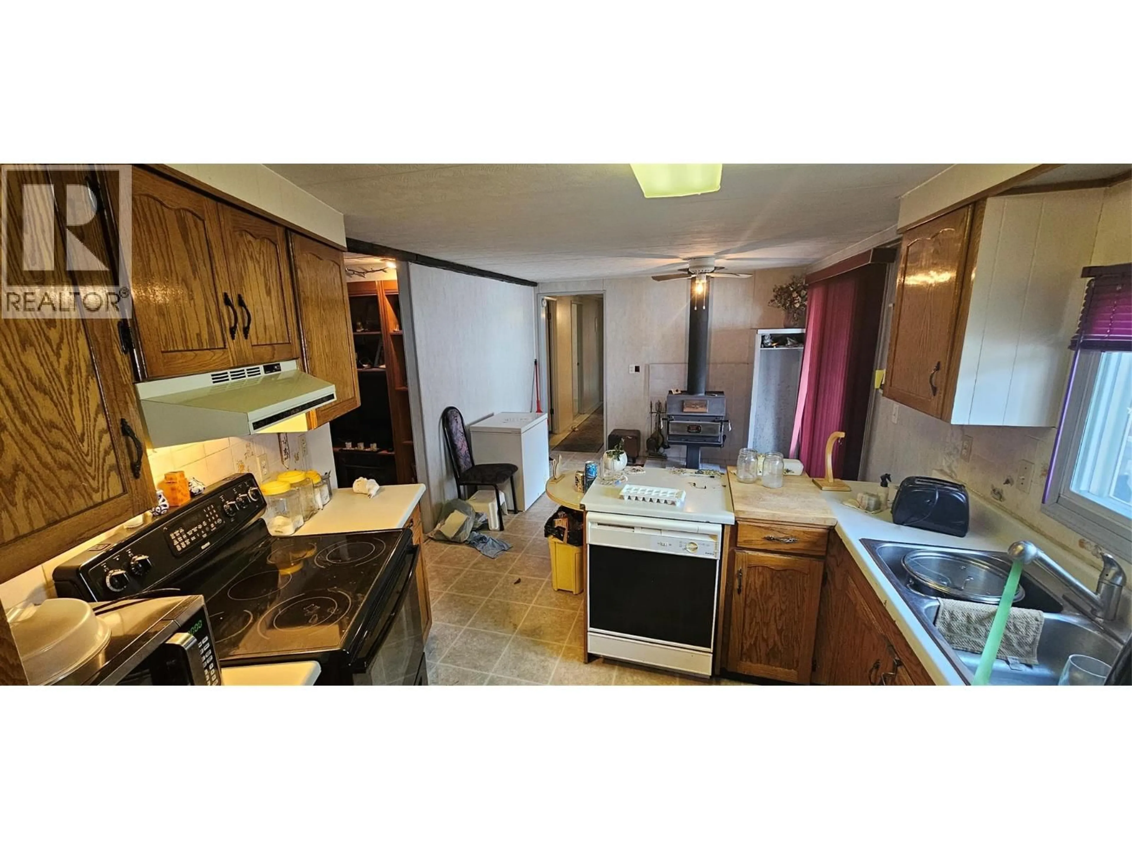 Standard kitchen, wood/laminate floor for 395 RED CEDAR CRESCENT, Sparwood British Columbia V0B2G0