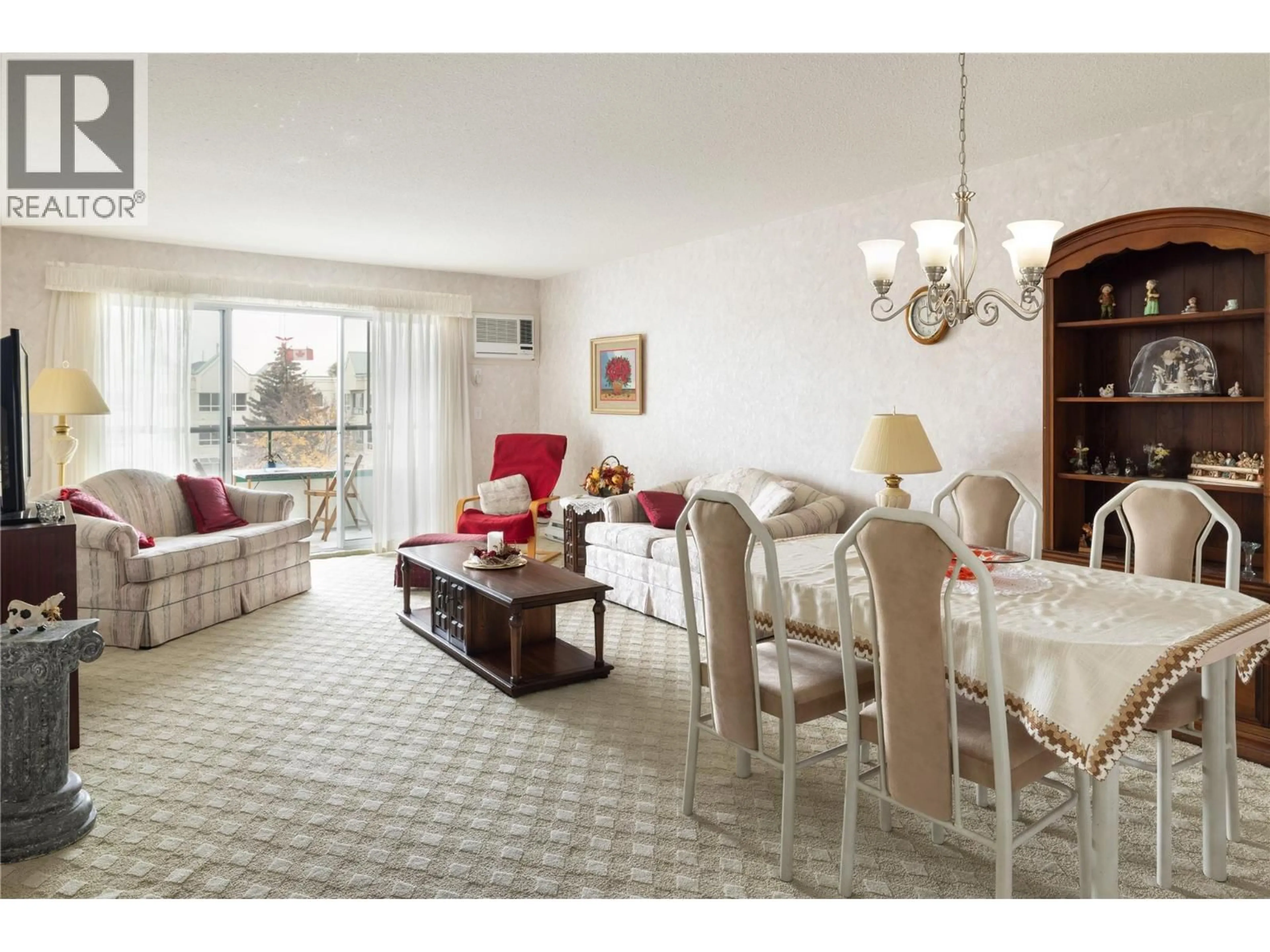 Living room with furniture, unknown for 418 - 1329 KLO ROAD, Kelowna British Columbia V1W3N9