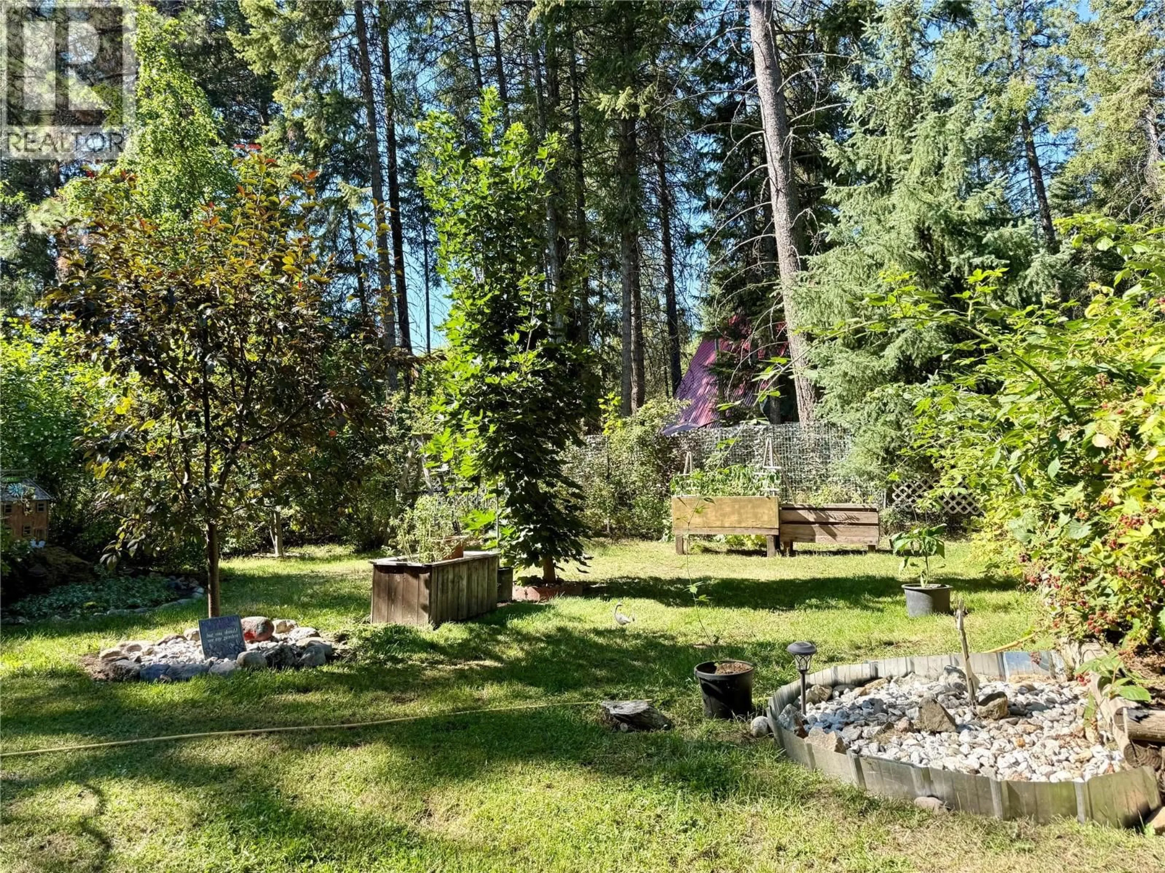A pic from outside/outdoor area/front of a property/back of a property/a pic from drone, forest/trees view for 1558 THOMPSON ROAD, Christina Lake British Columbia V0H1E0