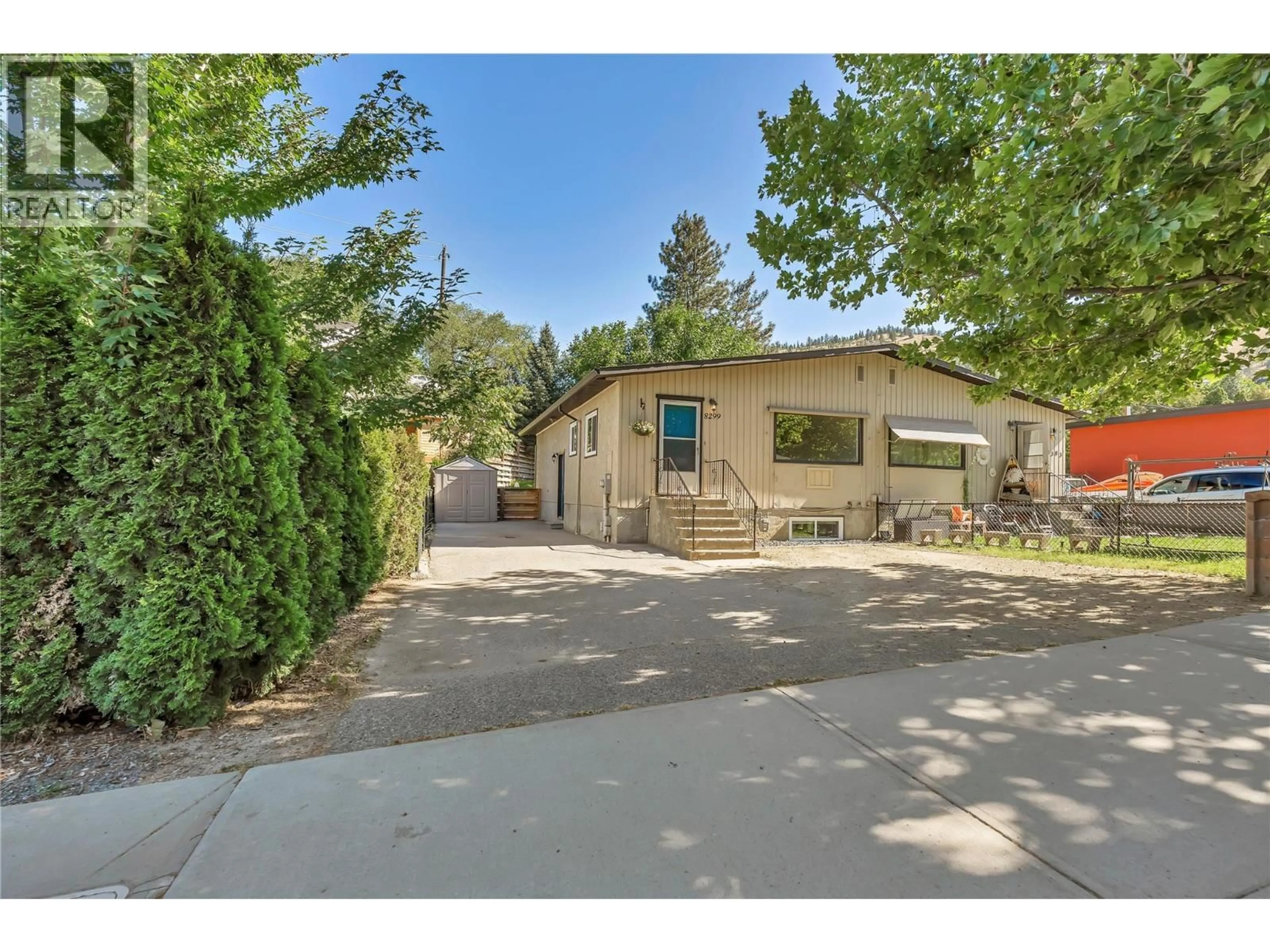 A pic from outside/outdoor area/front of a property/back of a property/a pic from drone, street for 8299 PRAIRIE VALLEY ROAD, Summerland British Columbia V0H1Z3