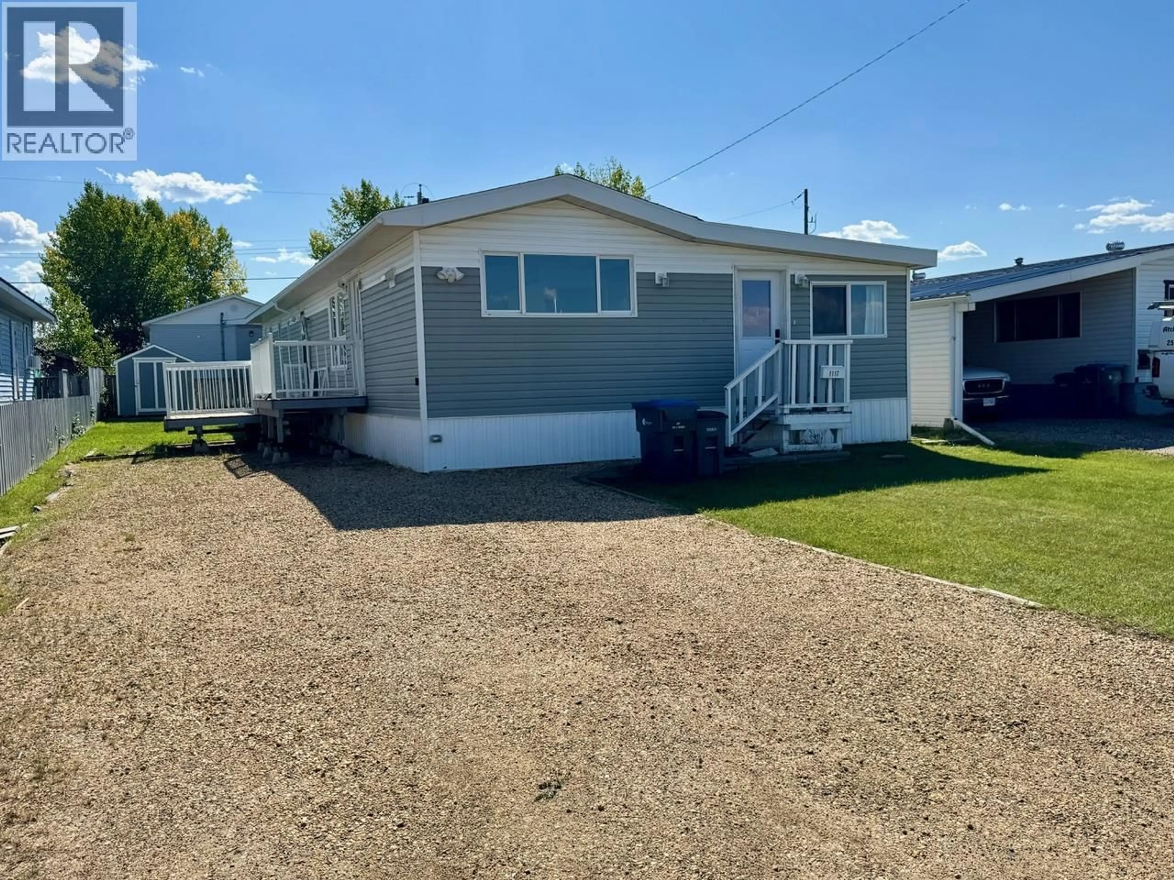 Home with vinyl exterior material, street for 1117 120 AVENUE, Dawson Creek British Columbia V1G3J9