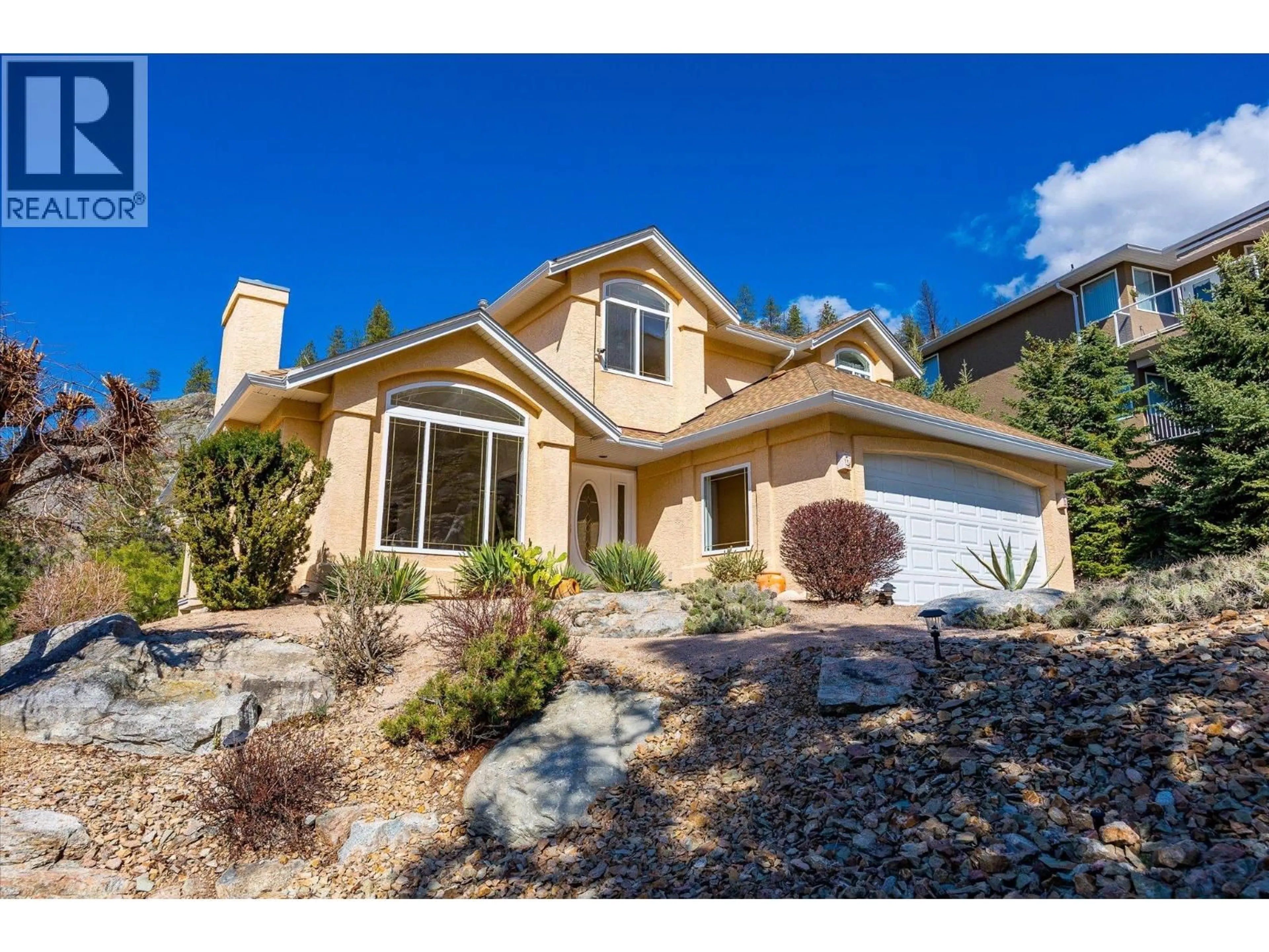 Home with vinyl exterior material, street for 161 CHRISTIE MOUNTAIN LANE, Okanagan Falls British Columbia V0H1R0