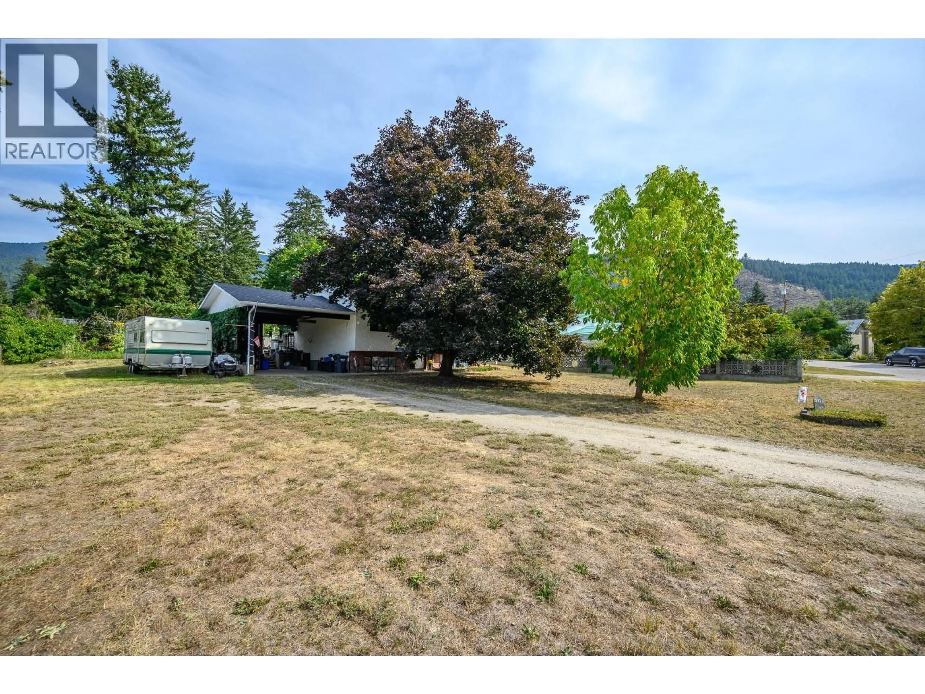 A pic from outside/outdoor area/front of a property/back of a property/a pic from drone, unknown for 3478 LOCKHART CRESCENT, Spallumcheen British Columbia V4Y0S9