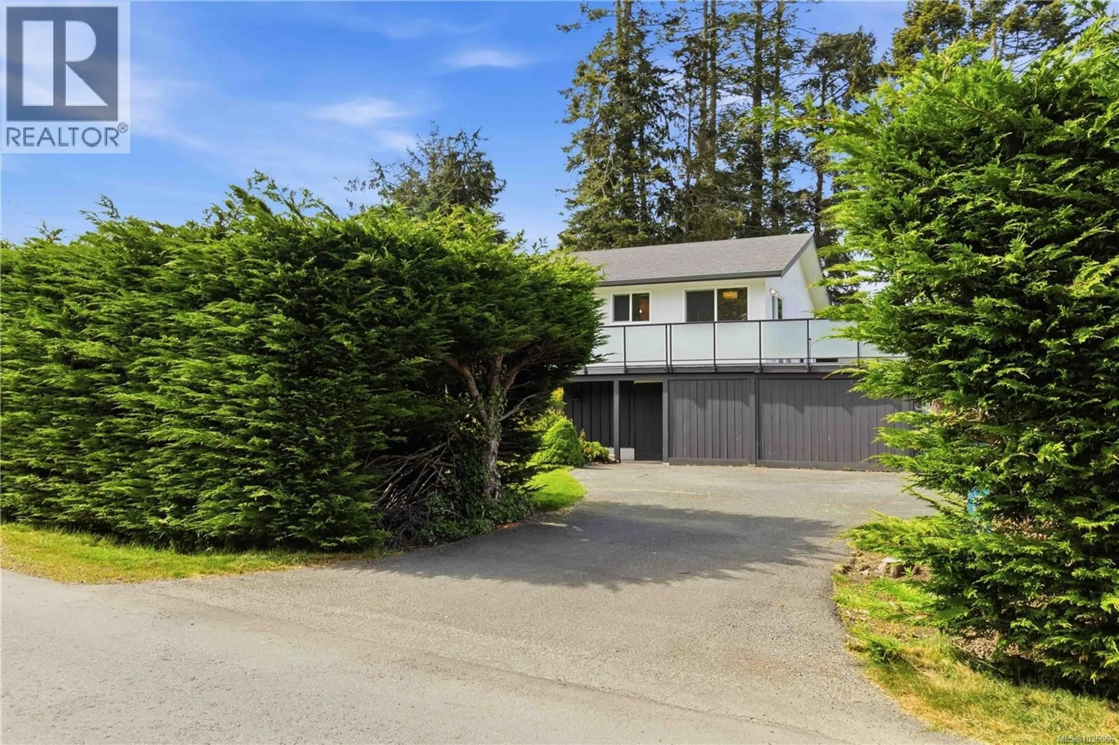 A pic from outside/outdoor area/front of a property/back of a property/a pic from drone, street for 7030 DEERLEPE ROAD, Sooke British Columbia V9Z0T5