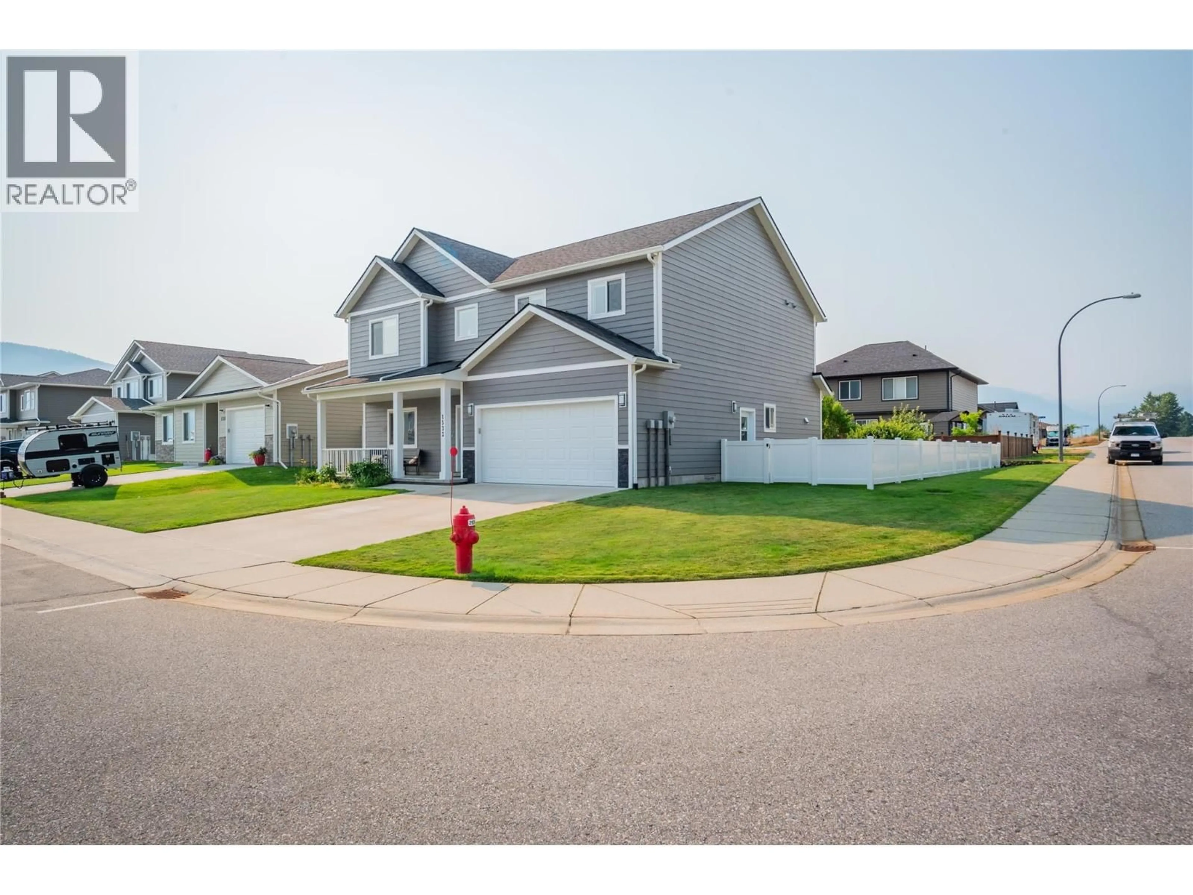 Home with vinyl exterior material, street for 1532 ASPEN LANE, Castlegar British Columbia V1N4X8